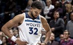 Karl-Anthony Towns (32) walked off the court at the end of the game. Washington beat Minnesota by a final score of 92-89.