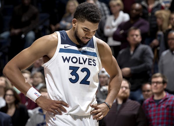 Karl-Anthony Towns (32) walked off the court at the end of the game. Washington beat Minnesota by a final score of 92-89.