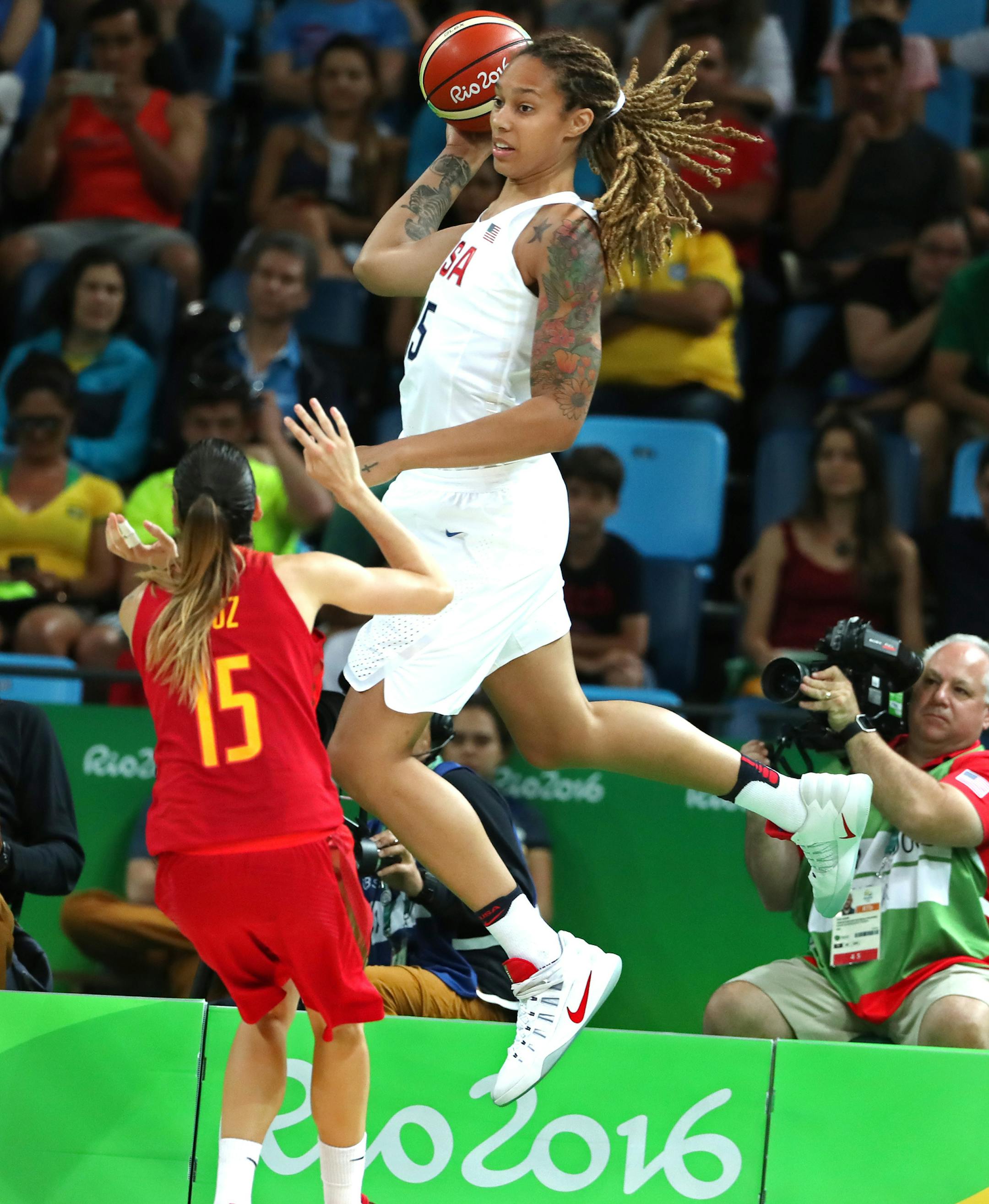 Women's basketball gold medal game. Team USAís Brittney Griner leaps up to save a loose ball, throwing it back inbounds over the head of Spainís Anna Cruz. The Lynx's Lindsay Whalen scored 17 points off the bench in the victory, giving the U.S. women's basketball team its sixth consecutive gold medal. ] 2016 Summer Olympic Games - Rio Brazil brian.peterson@startribune.com Rio de Janeiro, Brazil - 08/19/2016