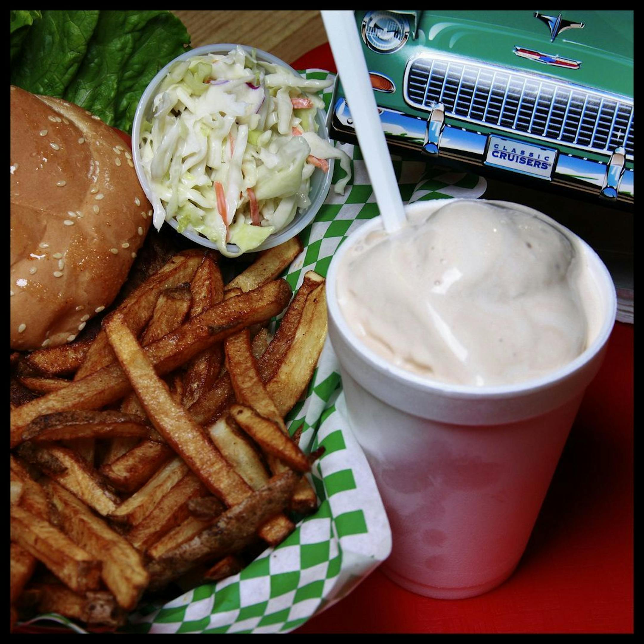 Steve Rice ¥ srice@startribune.com Minneaoplis, 09/13/2007 - Andy's Garage Andy Burger Basket (a juicy half-pound monster with cut-to-order fries and a super-creamy cole slaw) and a thick, hand-mixed malt.