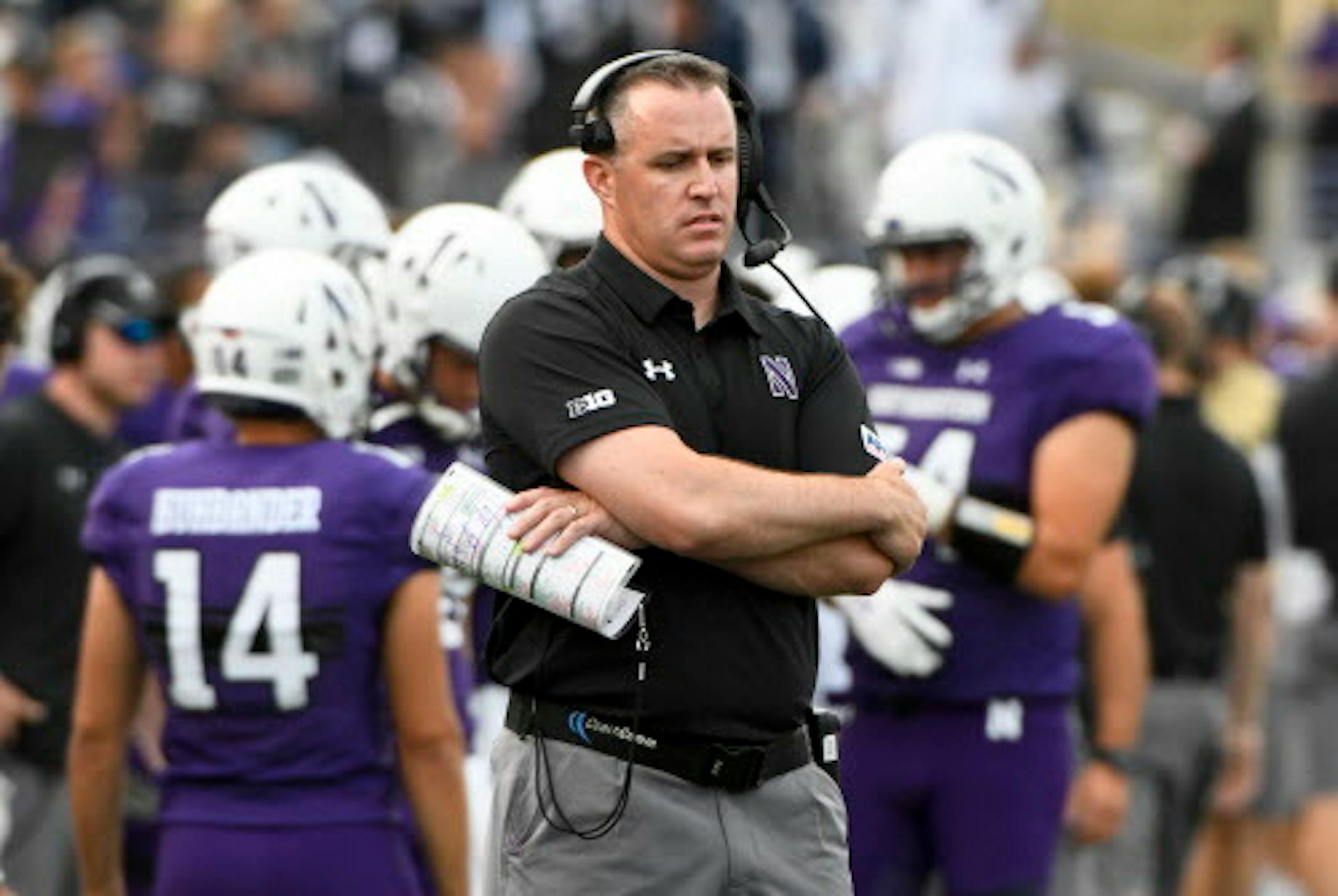 FILE - In this Sept. 2, 2017, file photo, Northwestern coach Pat Fitzgerald stands near the sideline during the second half of the team's NCAA college football game against Nevada in Evanston, Ill. Northwestern plays Maryland this week. Last week, Northwestern lost at home to Penn State 31-7 and Maryland was outclassed in a 62-14 rout at Ohio State. (AP Photo/Matt Marton, File)