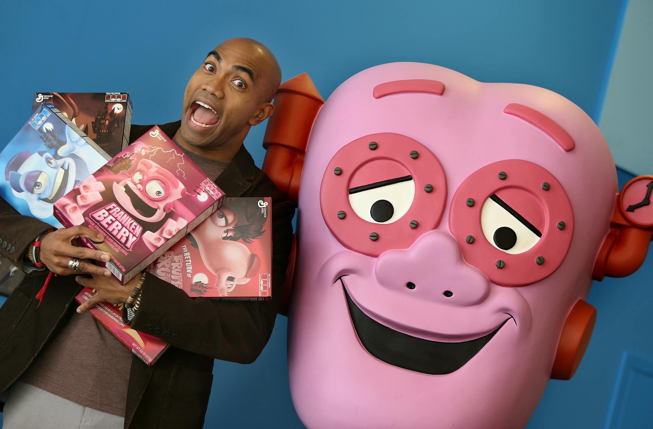 Ari Zainuddin, a General Mills marketing manager, is helping the company bring back the "monsters" cereals, including Count Chocula, Frankenberry, Boobery, Fruite Brute and Yummy Mummy. Here, Zainuddin showed off the cereal alongside his man-size Frankenberry Bobble Head at General Mills, Thursday, September 12, 2013 in Golden Valley, MN. (ELIZABETH FLORES/STAR TRIBUNE) ELIZABETH FLORES • eflores@startribune.com