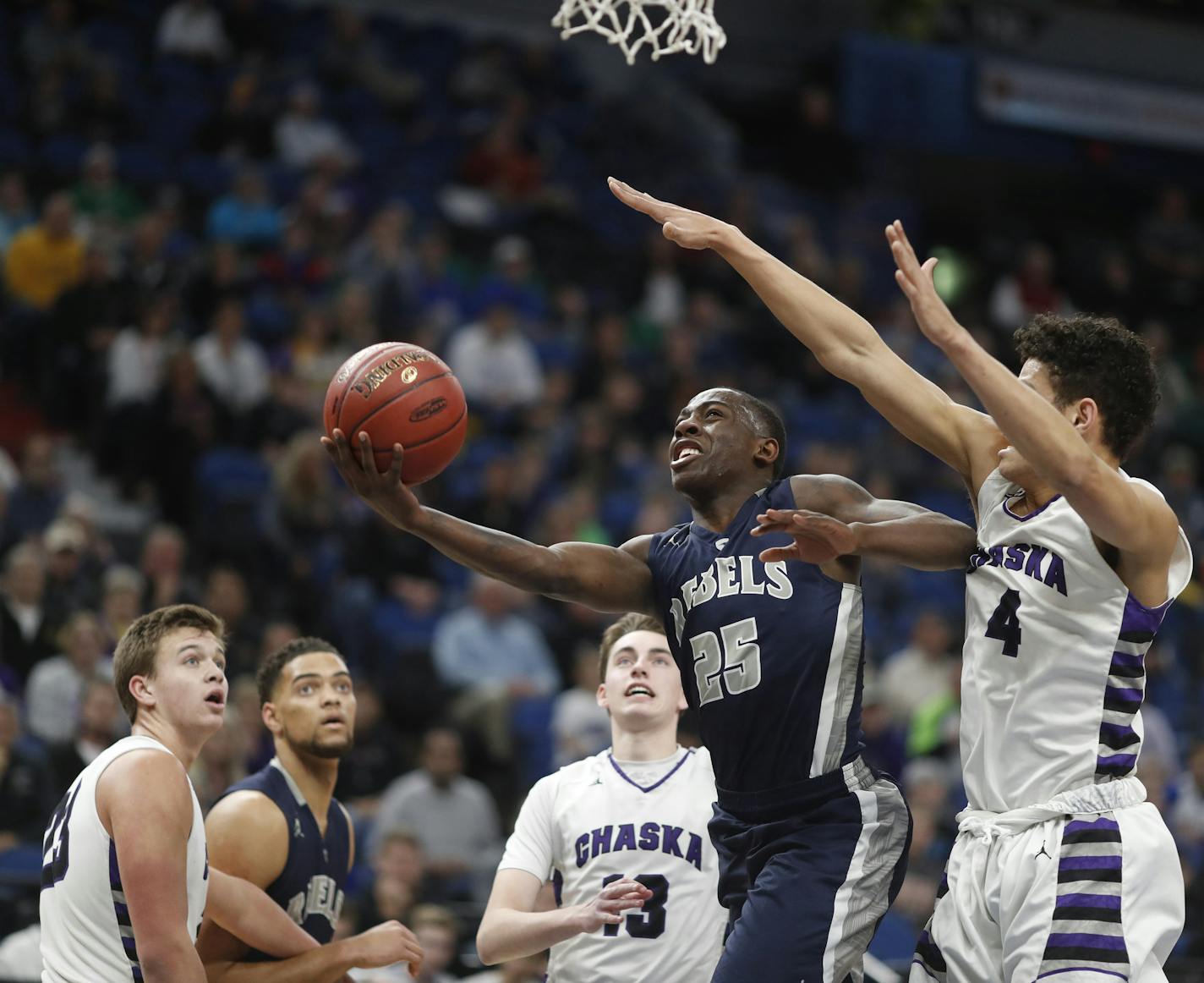 McKinley Wright of Champlin Park scored over Chaska's Myles Hanson during quarterfinal class 4A basketball action at Target Center Wednesday March 22 2017 in Minneapolis, MN.] Chaska vs Champlin Park . JERRY HOLT &#xef; jerry.holt@startribune.com