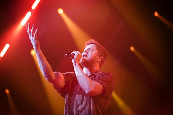 Dan Reynolds of the Imagine Dragons performs at the EA SPORTS Bowl in the Armory.