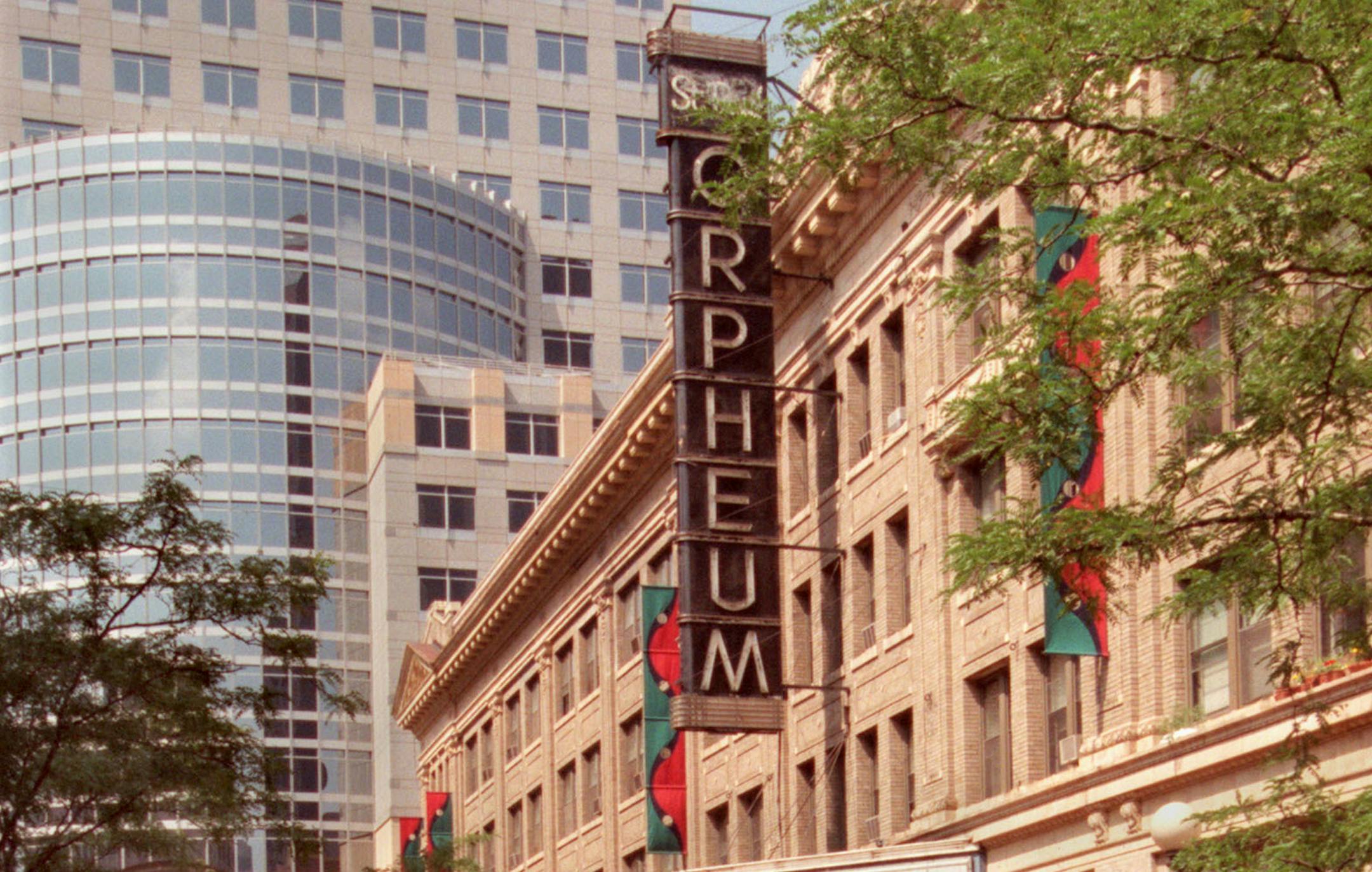 The Orpheum Theater in downtown St. Paul. -- Pheng Vue works at the FarmerÌs Market Tuesday on the 7th Place Mall with the Orpheum Theater in the background. ORG XMIT: MIN2013050810405239
