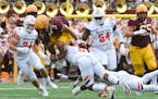 Trey Potts (3) went airborne on this second-quarter play for the Gophers against Bowling Green on Sept. 11.