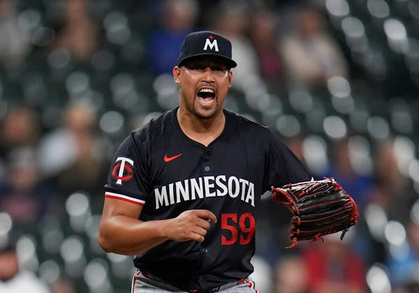 Twins closer Jhoan Duran reacts after striking out the White Sox's Andrew Vaughn to secure his team's ninth victory in a row, 6-5 over Chicago on Tues