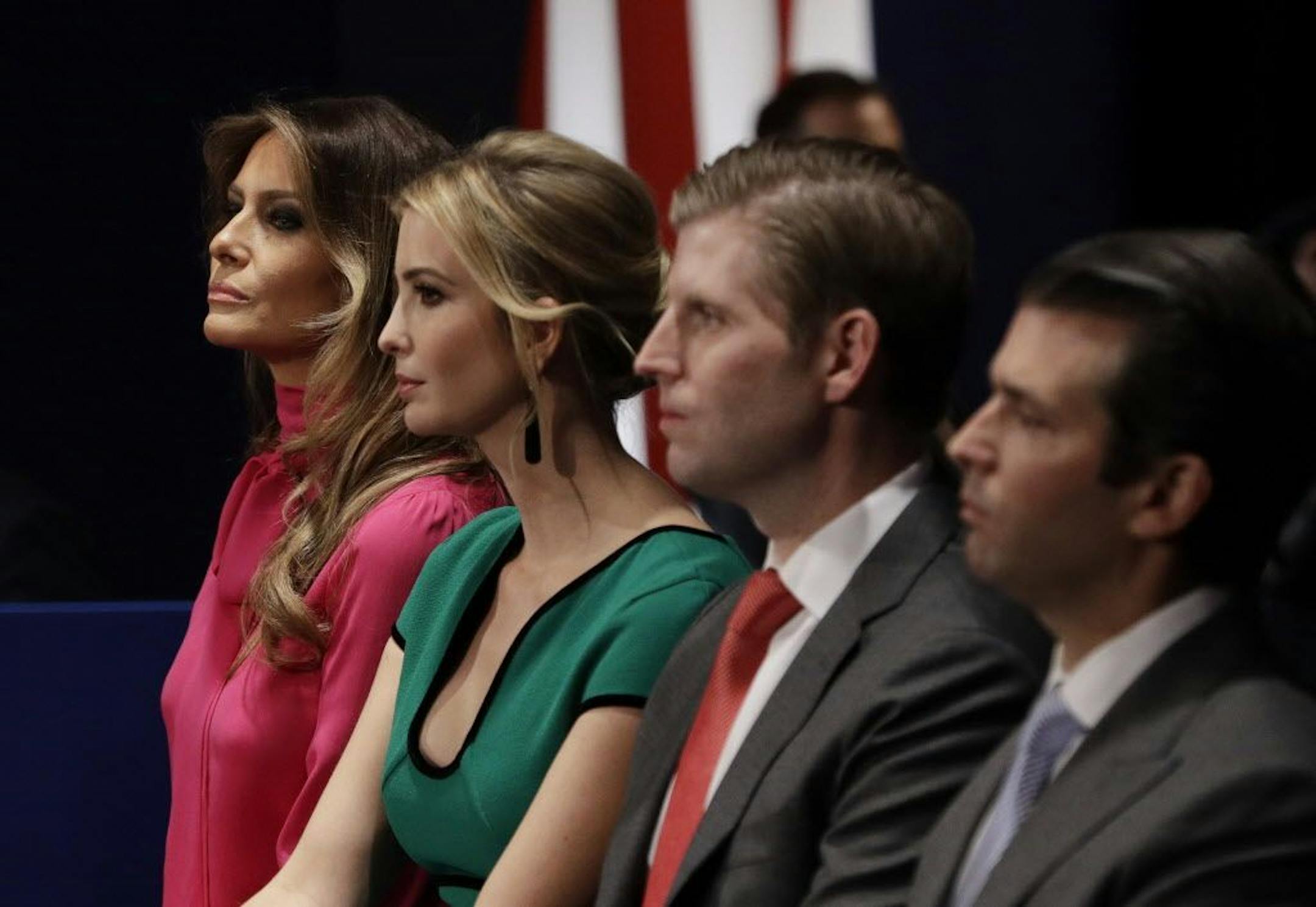 FILE - In this Sunday, Oct. 9, 2016 file photo, from left, Melania Trump, Ivanka Trump, Eric Trump and Donald Trump, Jr. wait for the second presidential debate between Donald Trump and Democratic presidential nominee Hillary Clinton at Washington University in St. Louis.