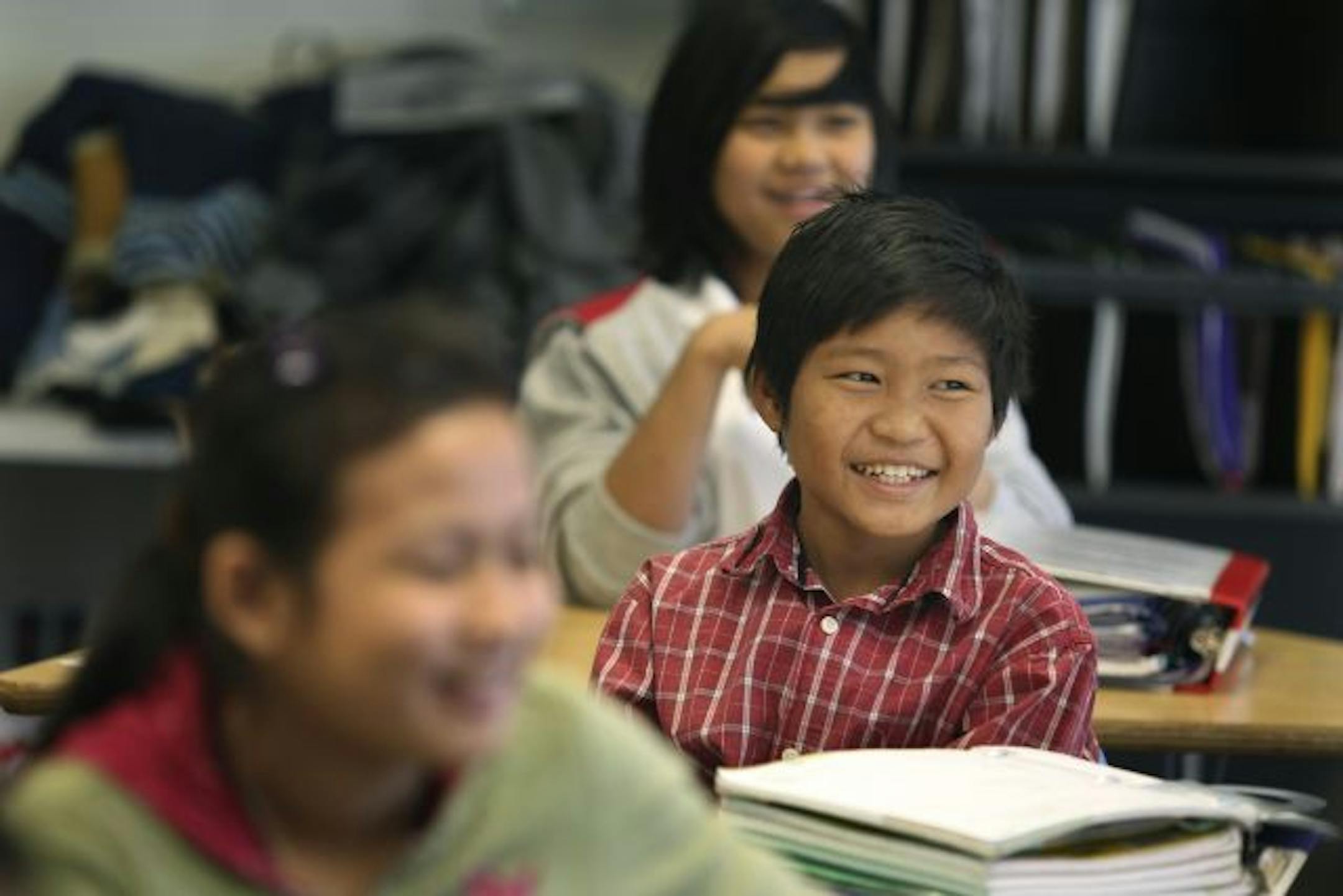 Henerry Cho, 12, sounded out vowels during his ELL class at Washington Technology Magnet School. Henerry and his family are Karen immigrants who fled Myanmar, formerly Burma, two years ago. He has some trouble in English, but says he's a math whiz.