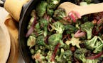 Charred broccoli combines with a tangy dressing and toasted nuts.