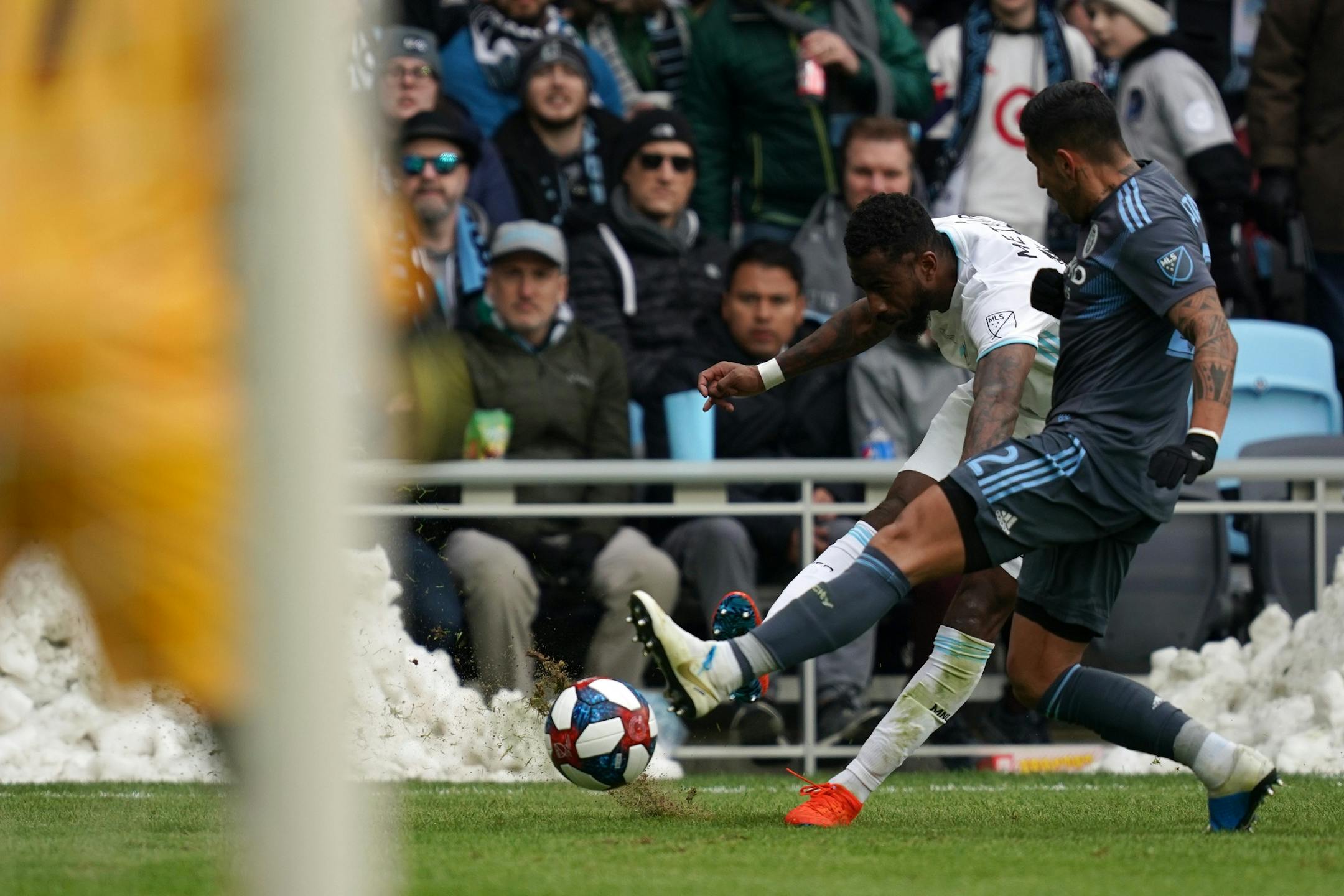 Minnesota United defender Romain Metanire (19) tried to get a shot off on New York City goalkeeper Sean Johnson (1) as New York City defender Ronald Matarrita (22) stepped in to defend in the second half.