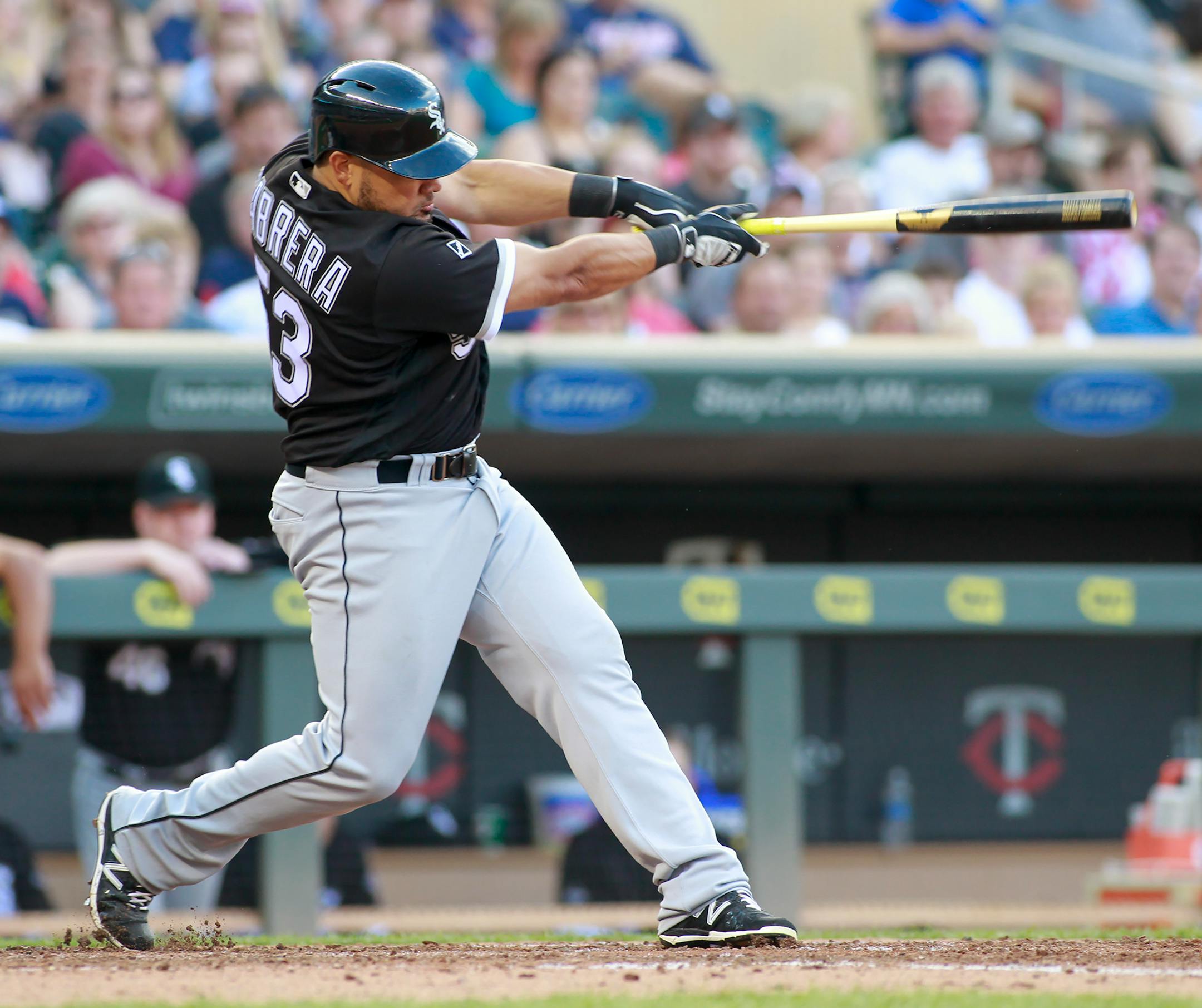Chicago White Sox's Melky Cabrera connects for a two-run double during the fifth inning of an baseball game against the Minnesota Twins, Saturday, July 30, 2016, in Minneapolis. (AP Photo/Paul Battaglia)