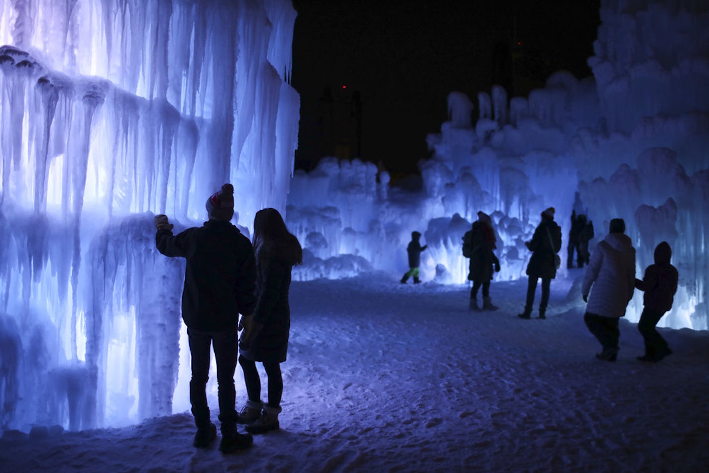 Visitors inside the Ice Castles at the Lift Bridge Sunday night. ] JEFF WHEELER &#x2022; jeff.wheeler@startribune.com The town of Stillwater is hosting Ice Castles at the Lift Bridge in Lowell Park from now until as late as March, depending on the weather. The frozen spectacle is open daily afternoons and evenings, except Tuesdays.