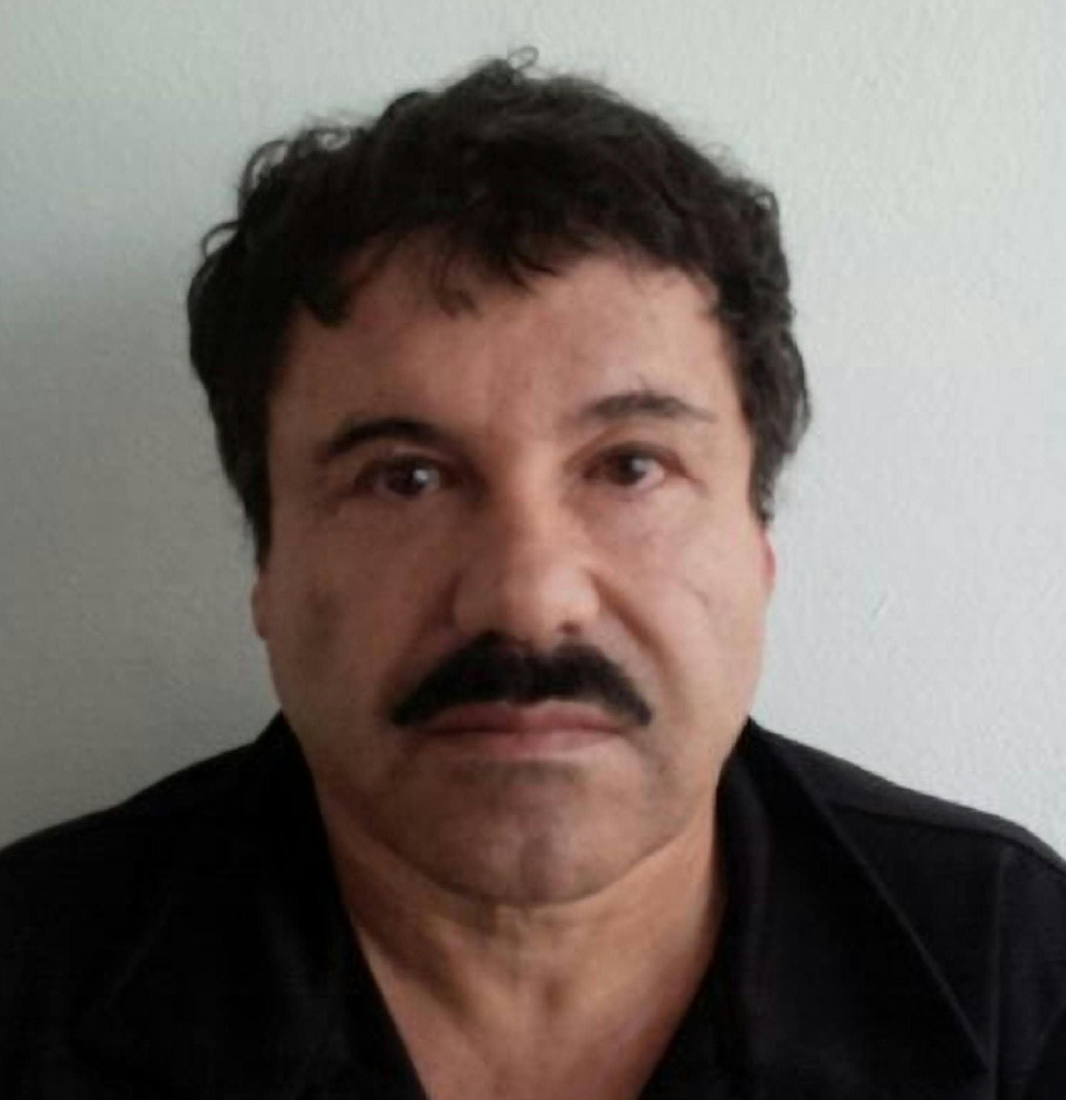 In this image released by Mexico's Attorney General's Office, Saturday, Feb. 22, 2014, Joaquin "El Chapo" Guzman is photographed against a wall after his arrest in the Pacific resort city of Mazatlan, Mexico. After 13 years on the run, narrow escapes from the military, law enforcement and rivals, Joaquin ìEl Chapoî Guzman is back in Mexican custody. Now starts what is likely to be a lengthy and complicated legal process to decide which country gets to try him first. (AP Photo/PGR)