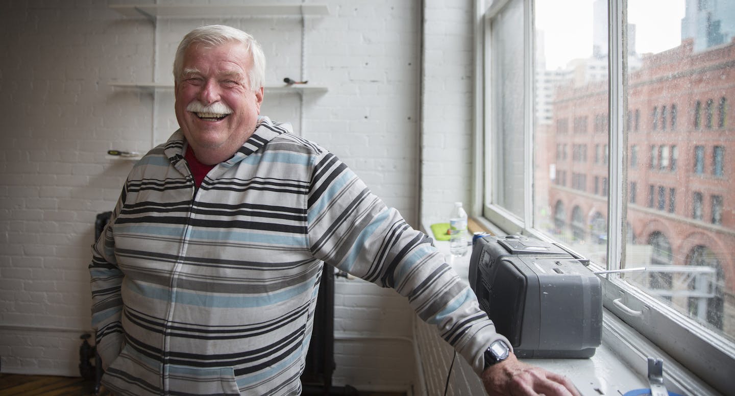 Chuck Gross, the owner of the Savoie Building in the North Loop, chats while checking on the progress of a rental unit in his building on Monday, April 20, 2015. ] LEILA NAVIDI leila.navidi@startribune.com /