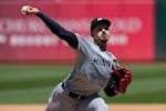 The Twins' Pablo López pitches Sunday at Oakland. He struck out 14, walked one and gave up just two hits in eight innings.