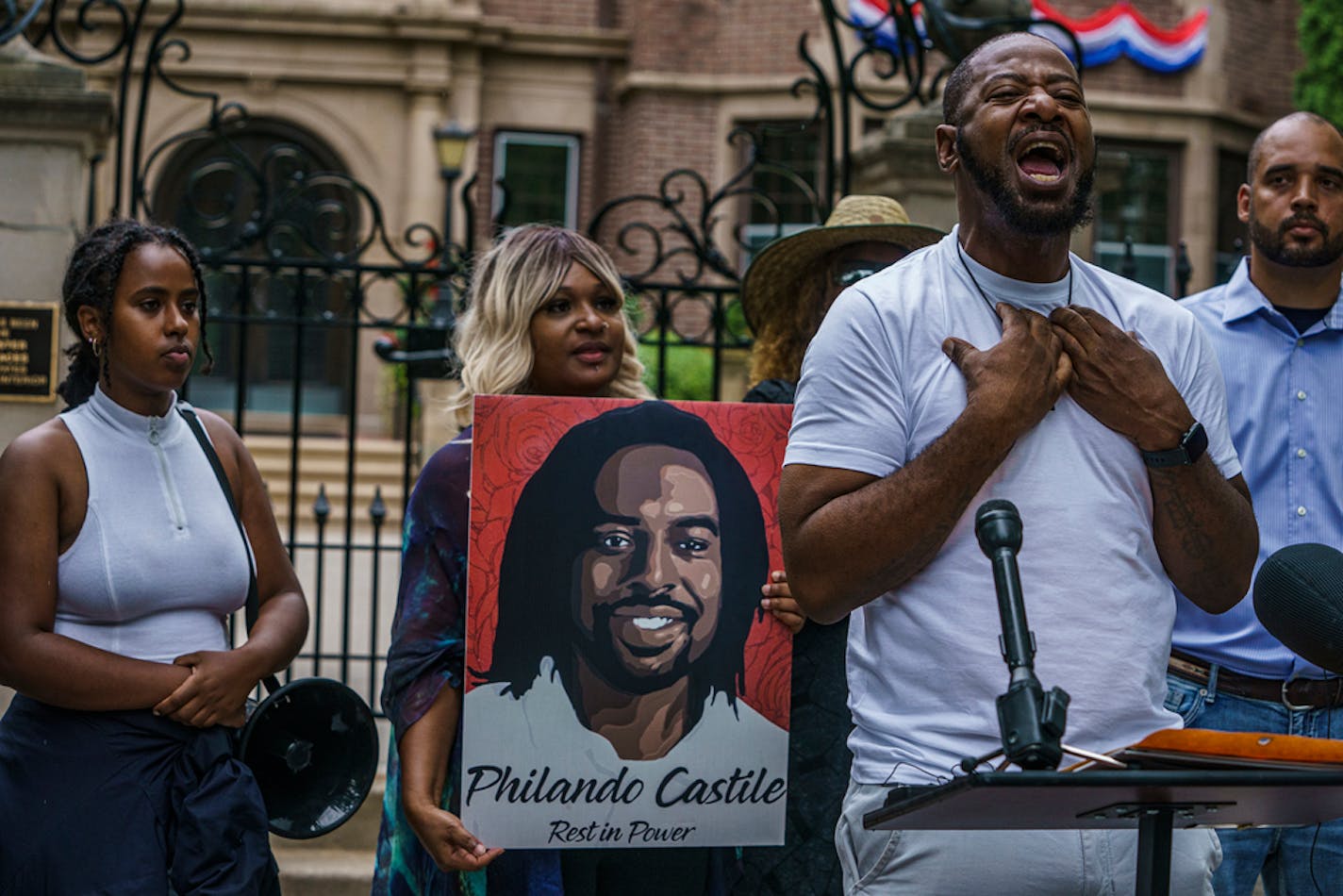 In St. Paul, Minnesota on July 6, 2021,in front of the Minnesota Governor's Mansion, State Representative John Thompson spoke about his work towards police reform in front of protesters who gathered for the 5th anniversary of Philando Castile's death at the hands of police.] RICHARD TSONG-TAATARII ¥ Richard.Tsong-Taatarii@startribune.com