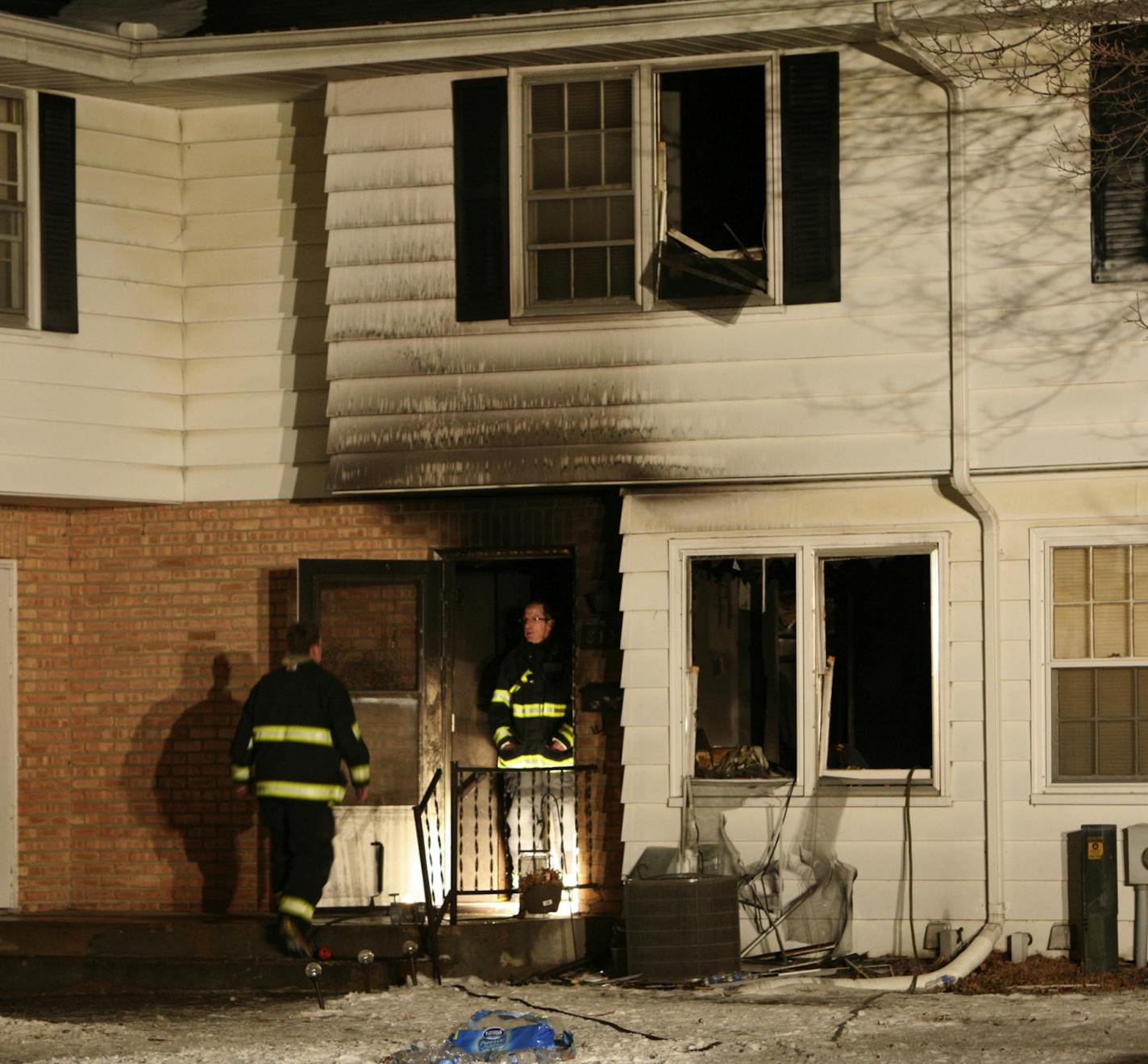 PHOTO BY PETER MATTHEWS, SPECIAL TO THE STAR TRIBUNE. There was a fatal townhome fire in the 8100 block of Bloomington Avenue in Bloomington about 10 p.m. Monday, Jan. 30. Cops arrived to hear the female occupant shouting for help and firefighter removed her. Word from the scene is that she succumbed to her injuries at HCMC.