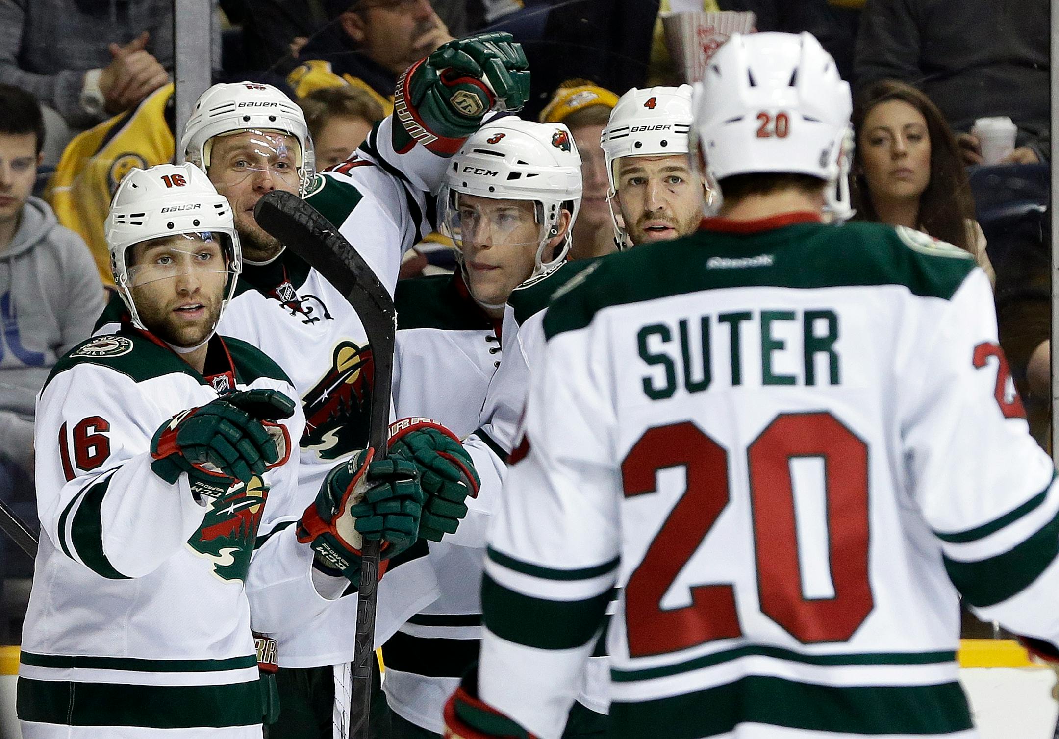 Jason Zucker (16) and Charlie Coyle, center, are two of the Wild youngsters who use extra work after practice to aid in their development.