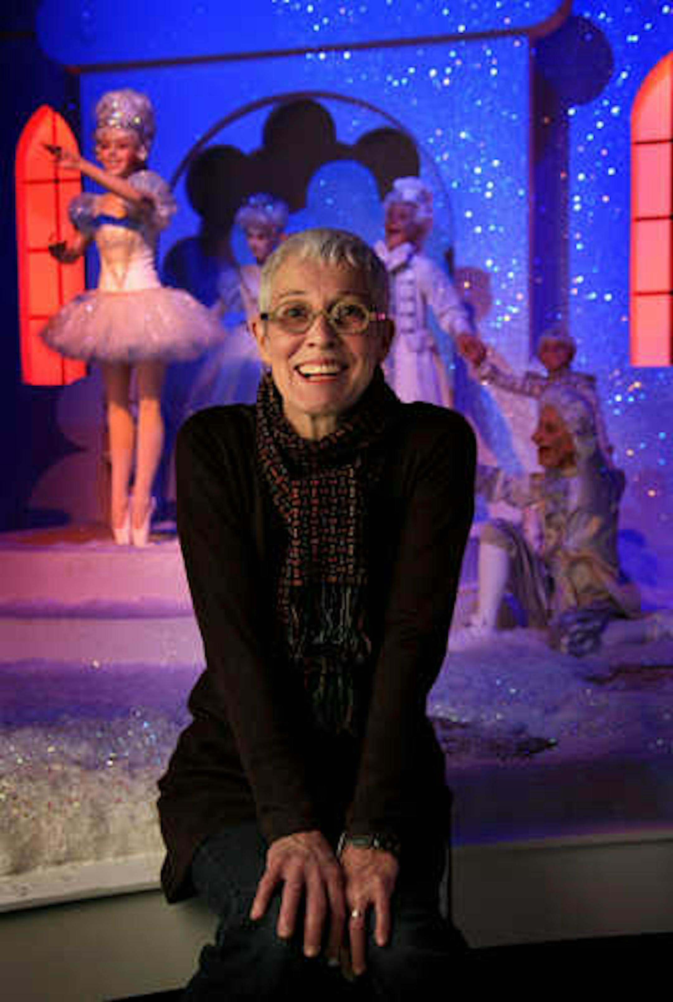 Steve Rice &yen; srice@startribune.comMinneapolis, 11/8/2007 - Eileen Troxel, won the holiday cookie contest with an Orange-Chocolate Cookie and sits in front of the candy land Nutcracker display at the Minneapolis downtown Macy's.