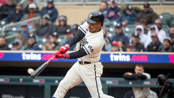 Minnesota Twins' Jorge Polanco bats against the Kansas City Royals in the third inning of a baseball game Sunday, April 30, 2023, in Minneapolis. The 