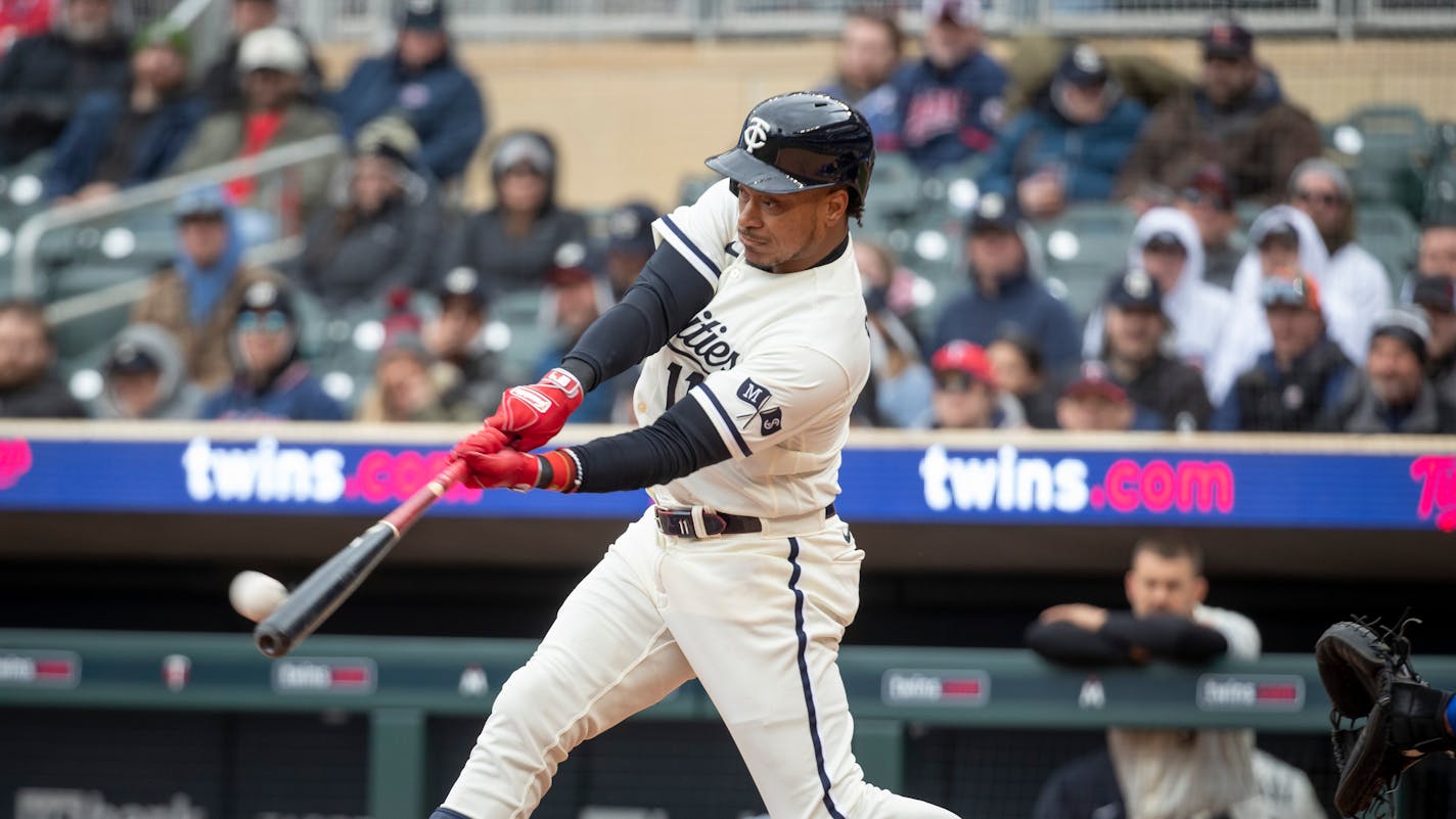 Minnesota Twins' Jorge Polanco bats against the Kansas City Royals in the third inning of a baseball game Sunday, April 30, 2023, in Minneapolis. The Twins won 8-4. (AP Photo/Bruce Kluckhohn)