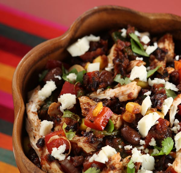 Black beans and black rice combine in a main dish that also packs in poblanos, corn, red peppers, queso fresco and more.