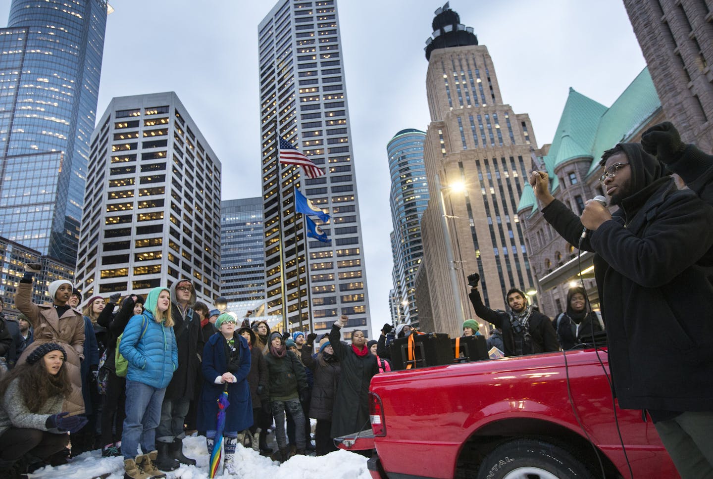 A crowd of around 100 chanted with Michael McDowell, right, of Black Lives Matter Minneapolis during a rally outside City Hall on Tuesday, December 1, 2015, in downtown Minneapolis, Minn. ] RENEE JONES SCHNEIDER &#x2022; reneejones@startribune.com