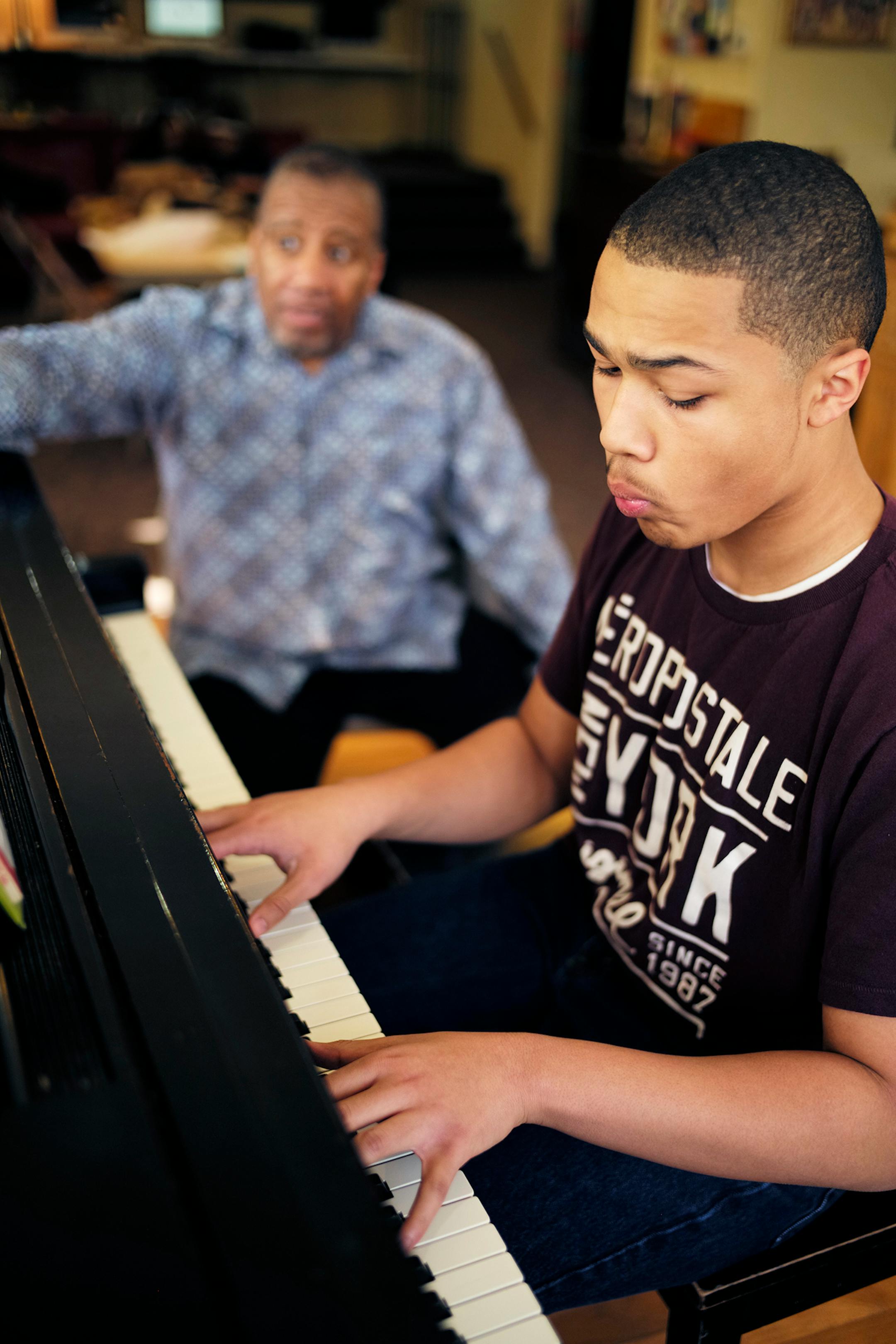 William Duncan was giving a lesson to Jaccob Williams. Williams takes lessons along with his younger sister Joshuyan. They come all the way from Maple Grove because of Walker West Music Academy's reputation.