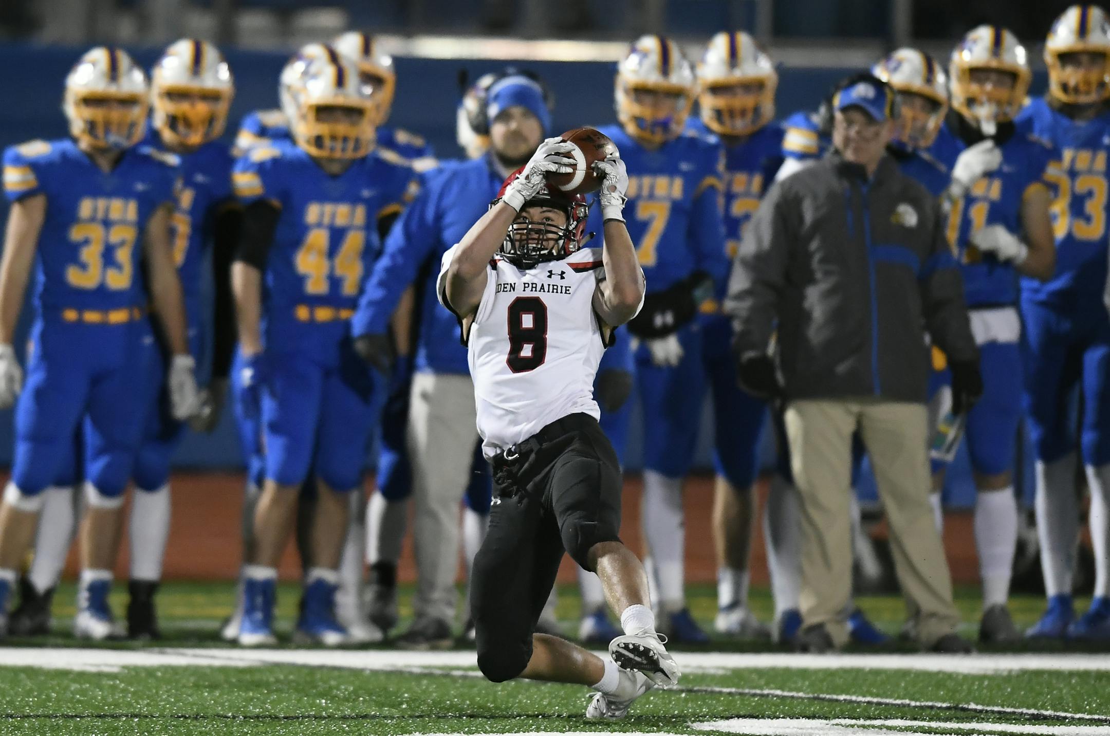 Eden Prairie defensive back Michael Tomsche (8) intercepted a ball thrown by St. Michael-Albertville quarterback Kolby Gartner (7), setting up the Eagles' game-winning touchdown drive in the fourth quarter. ] Aaron Lavinsky • aaron.lavinsky@startribune.com St. Michael-Albertville played Eden Prairie in a football game on Wednesday, Oct. 16, 2019 at St. Michael-Albertville High School in St. Michael, Minn.