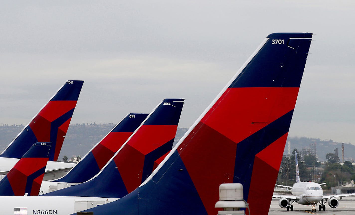 Delta is cutting back routes and capital spending as it adjusts to dropping demand for air travel as passengers around the world wait out effects of the coronavirus.