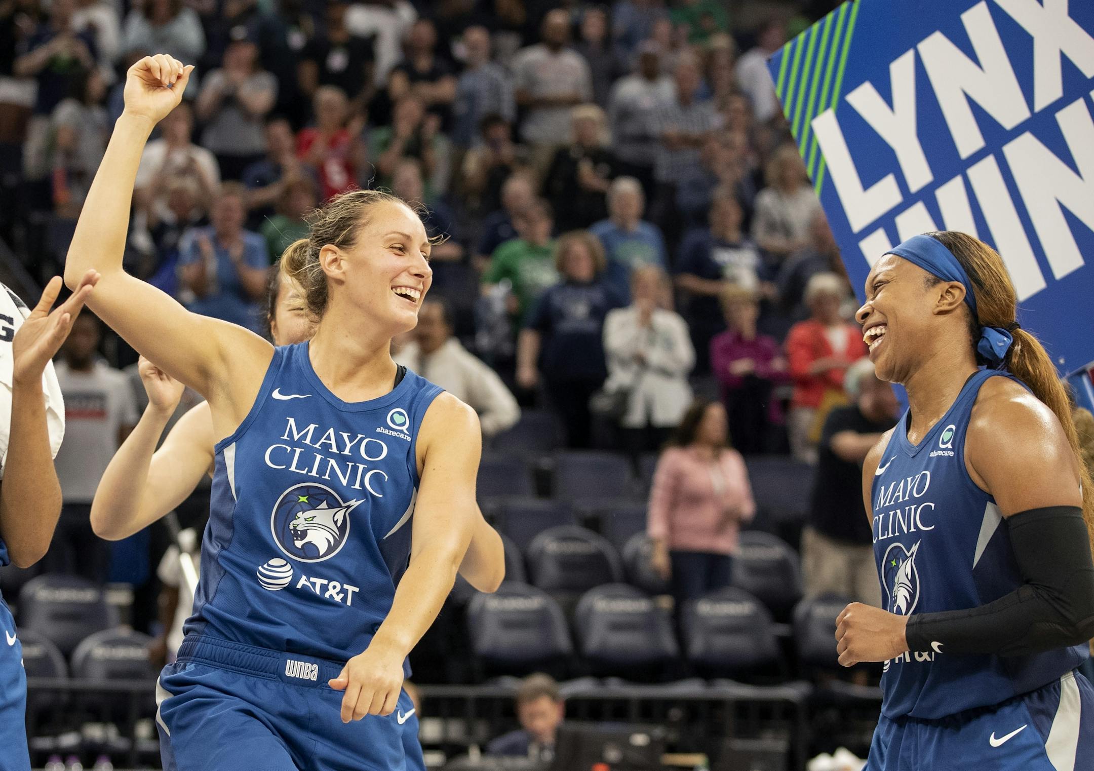 Minnesota Lynx Stephanie Talbot and Odyssey Sims celebrated at the end of the game. Minnesota beat Seattle 72-61.