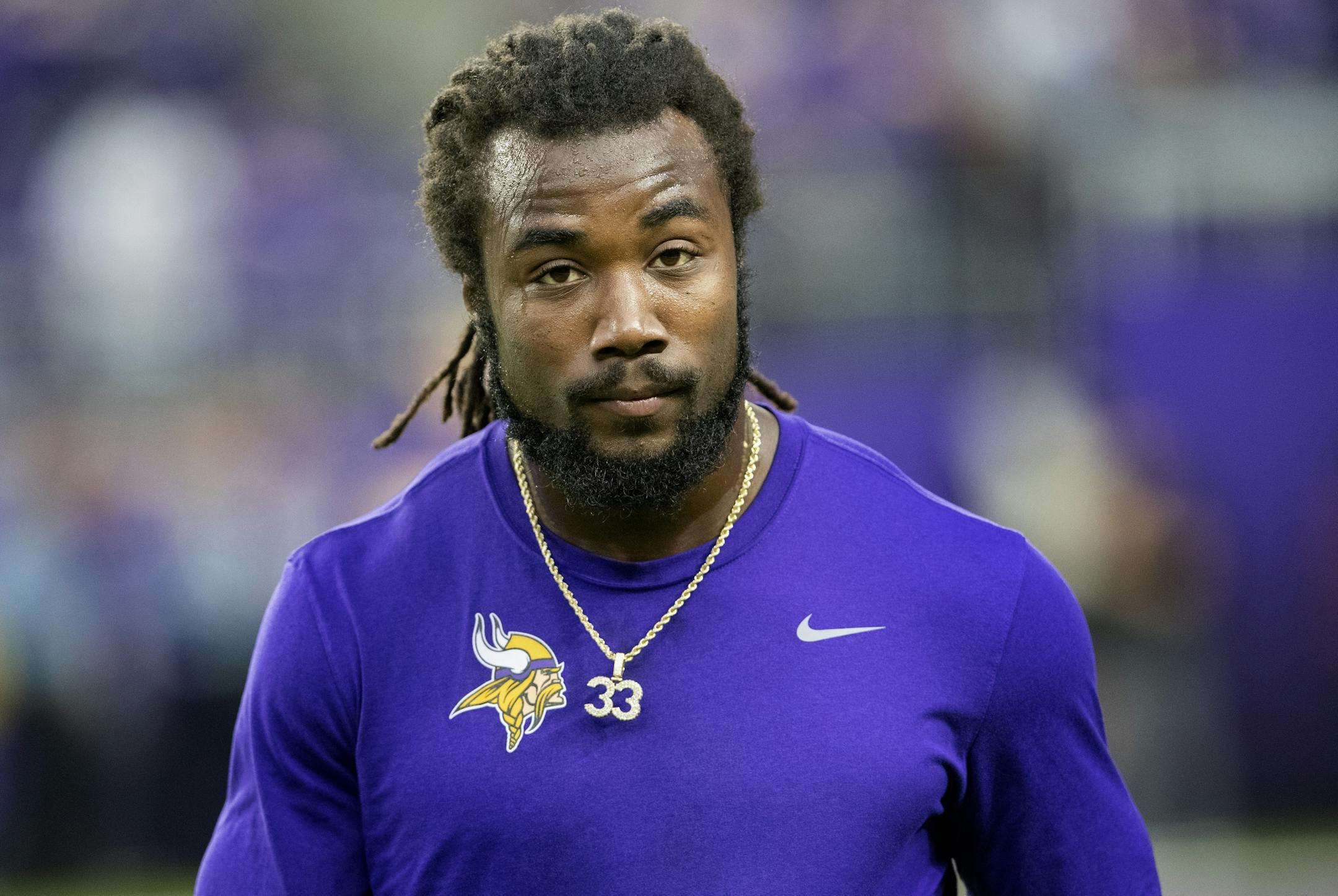 Vikings running back Dalvin Cook walked off the field after warmups.