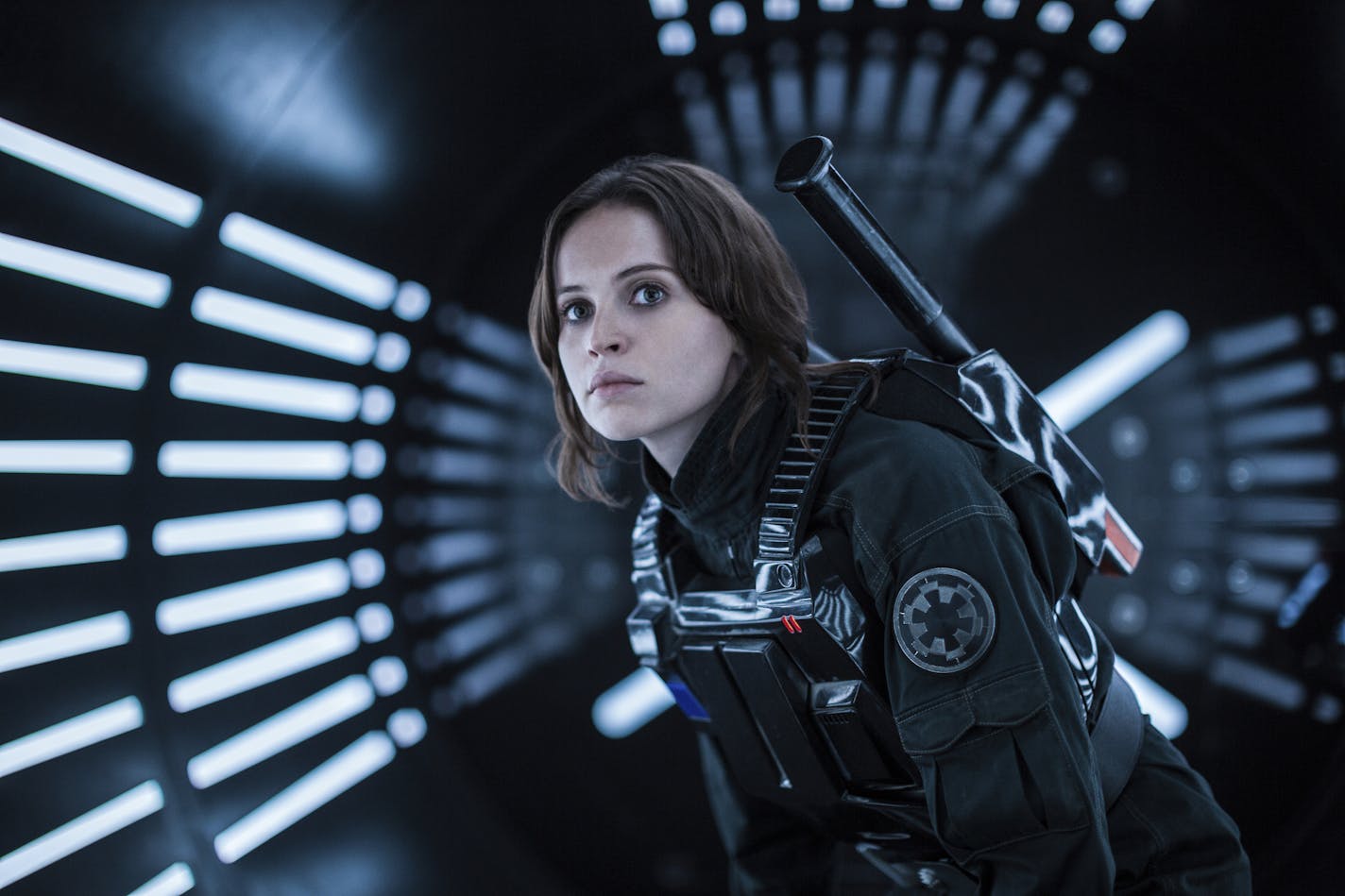 FILE - This file image released by Lucasfilm Ltd. shows Felicity Jones as Jyn Erso in a scene from, "Rogue One: A Star Wars Story." The &#xec;Star Wars&#xee; spinoff &#xec;Rogue One&#xee; has led the box office for the third straight week, taking in an estimated $64.3 million over the four-day New Year&#xed;s weekend. (Jonathan Olley/Lucasfilm Ltd. via AP, File)