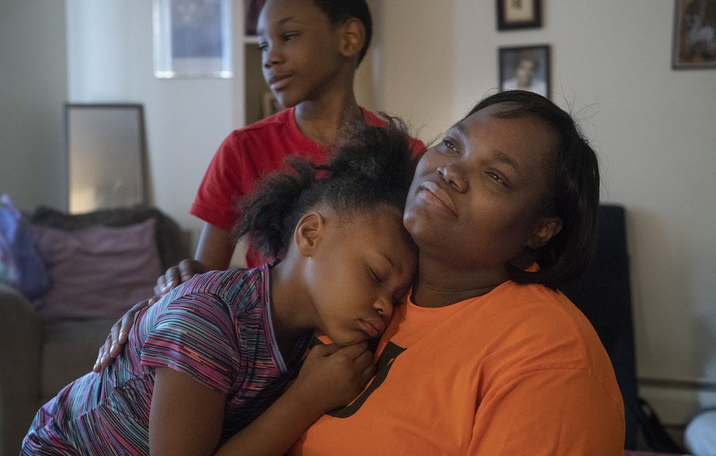 Jacinta Moss of St. Paul is working to give her children Malachi, 9, and A'Zaynia, 6, a calm space to process personal and world events.