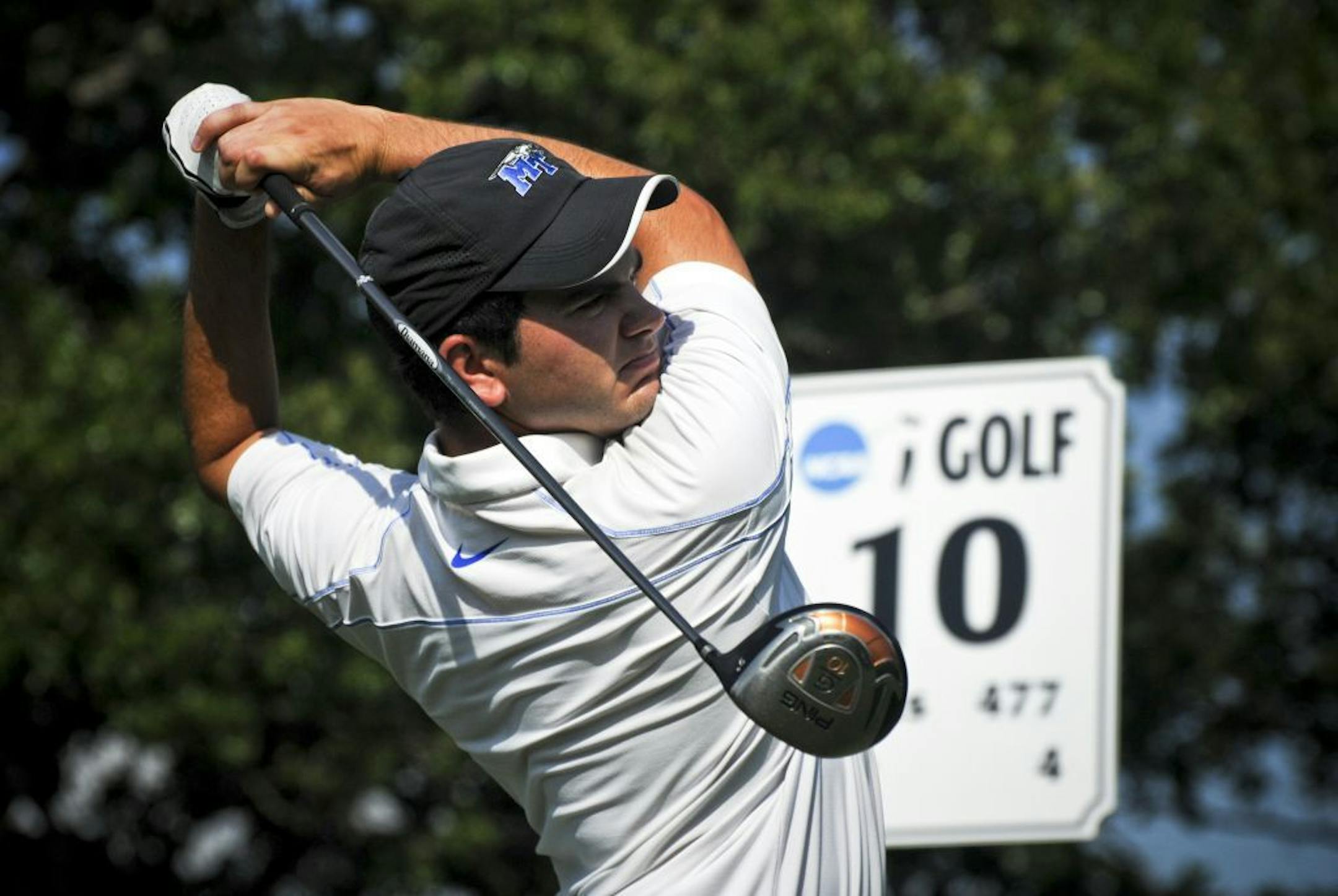 In this photo taken on May 31, 2011, and provided by Middle Tennessee State University, MTSU golfer Jason Millard tees off during the NCAA Divison 1 men's golf championship in Stillwater, Okla. Millard could be at Pinehurst No. 2 this week, playing in his first major championship. But he wouldn't have been able to live with himself. So, about an hour into his drive to North Carolina, he pulled over to the side of the road, called up a USGA official, and disqualified himself for what may - or may