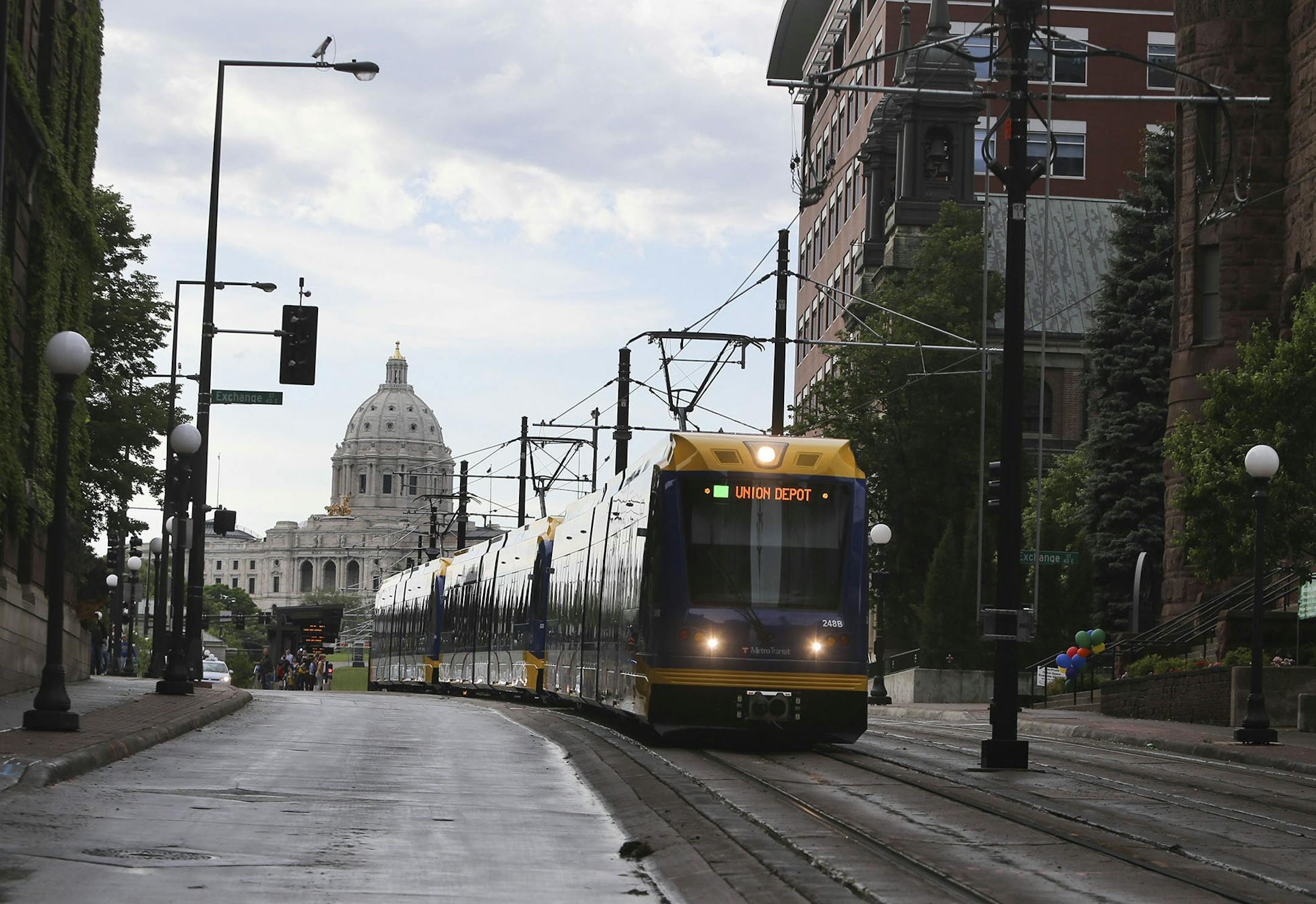 A train leaves the 10th Street station headed west Saturday, June 14, 2014, in downtown St. Paul, MN.] (DAVIDJOLES/STARTRIBUNE) djoles@startribune.com After more than a decade of planning and nearly a billion dollars of public money, the Twin Cities' second light-rail line begins running Saturday as officials cut ribbons for the Green Line. ORG XMIT: MIN1406141936510706 ORG XMIT: MIN1407191618131587