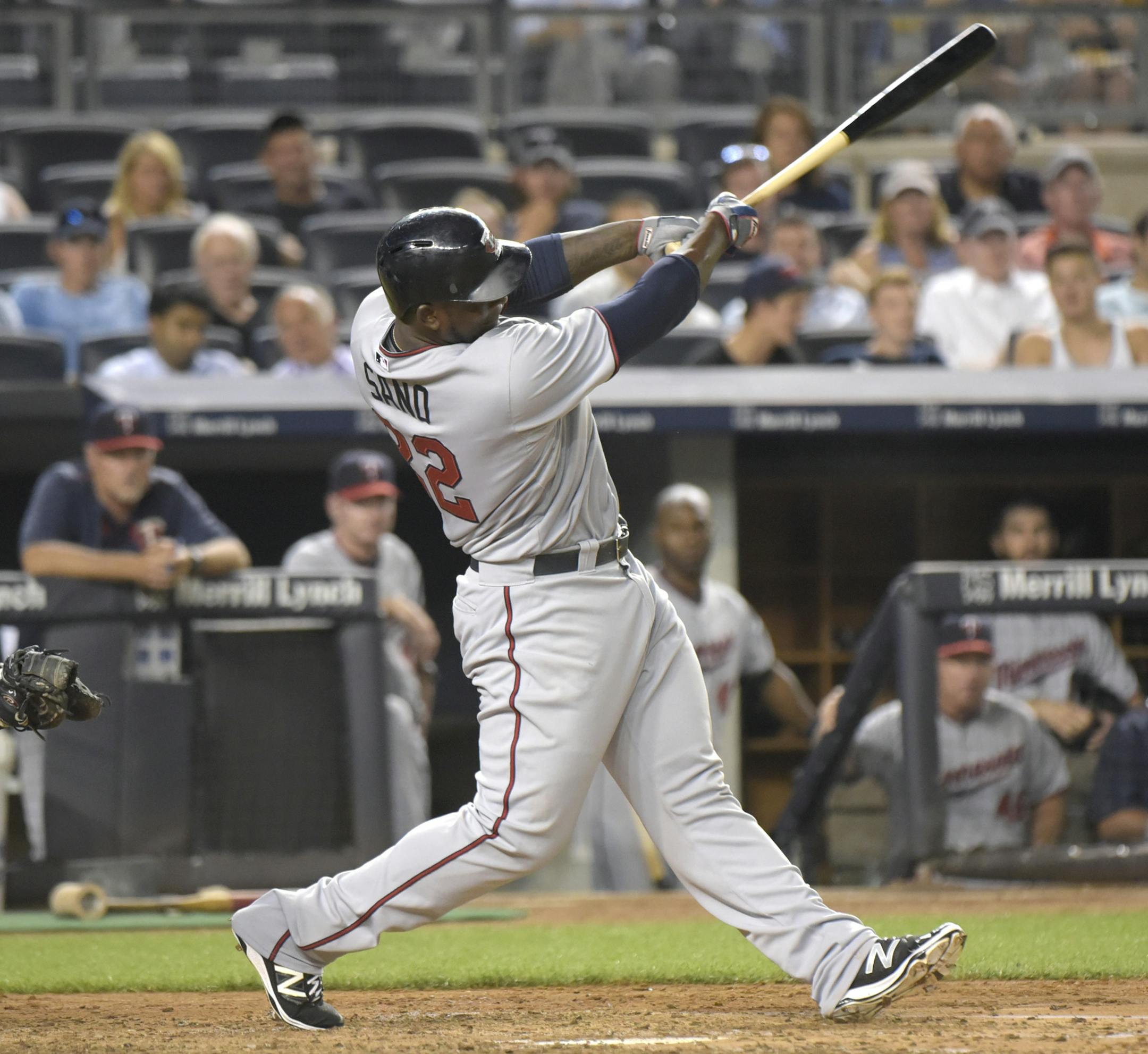 Minnesota Twins' Miguel Sano hits a two-run home run as New York Yankees catcher Brian McCann, left, looks on during the third inning of a baseball game Monday, Aug 17, 2015, at Yankee Stadium in New York. (AP Photo/Bill Kostroun)