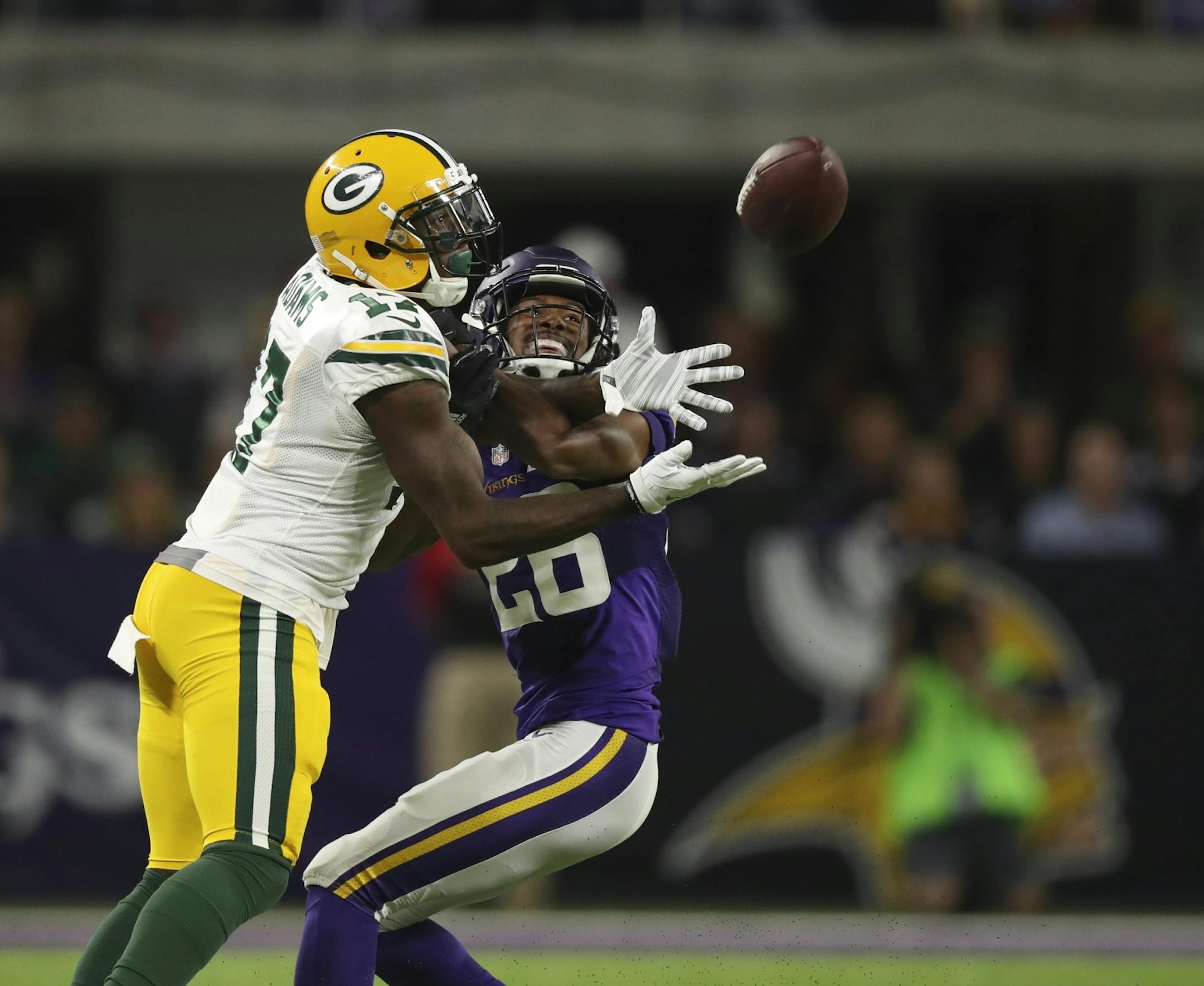 Vikings cornerback Trae Waynes (26) broke up a third quarter pass intended for Green Bay Packers wide receiver Davante Adams (17) and drew an offensive pass interference penalty on Adams on the play.