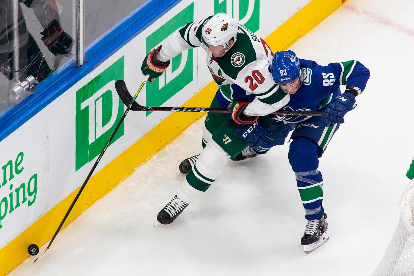 Wild defenseman Ryan Suter (stickhandling past Vancouver's Jay Beagle) played a team-high 23 minutes, 36 seconds against the Canucks in Game 1 on Sunday, but the team's depth also played a big role in Minnesota's 3-0 victory