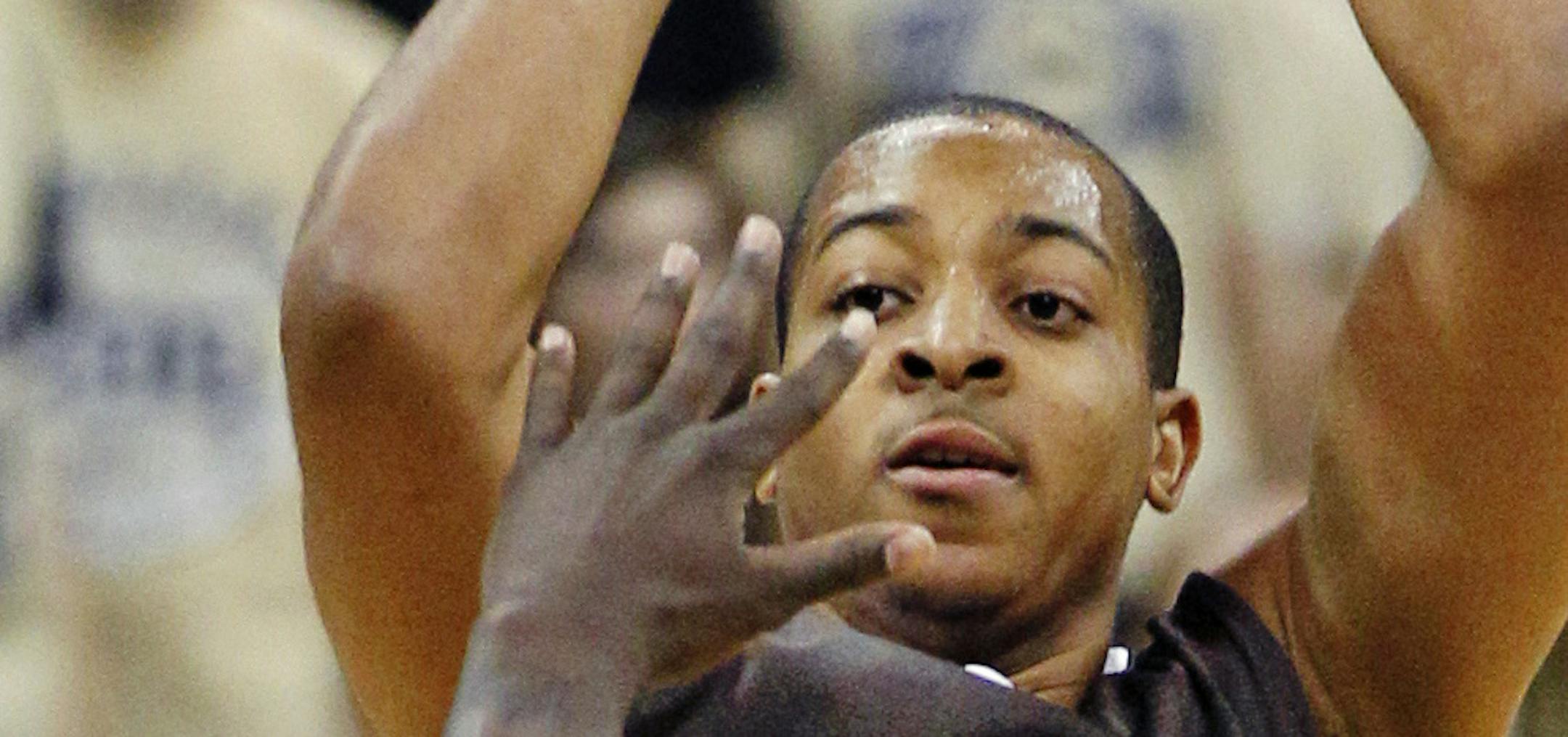 FILE - Lehigh's C.J. McCollum (3) shoots over Pittsburgh's Talib Zanna in the second half of their NCAA college basketball game in the NIT Season Tip-Off tournament, in this Nov. 13, 2012 file photo taken in Pittsburgh. As the college basketball season nears its midpoint, the player of year honor appears to be up for grabs with roughly two dozen players who could be considered the best in the country.C.J. McCollum is among a Pick 6 of players having outstanding seasons so far. (AP Photo/Keith Sr