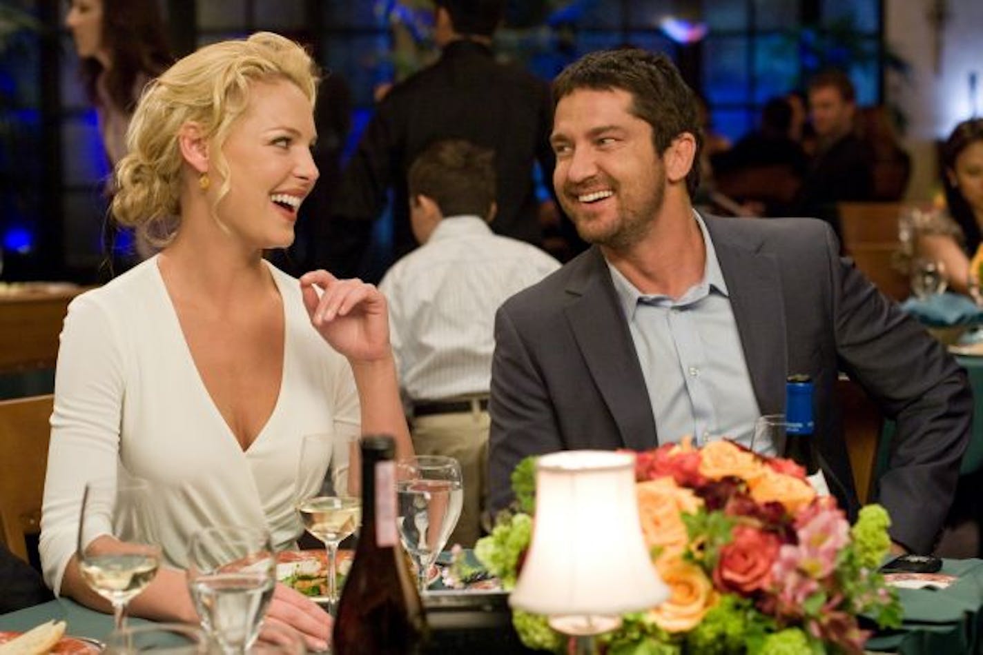 In this film publicity image released by Columbia Pictures, Gerard Butler, right, Katherine Heigl are shown in a scene from "The Ugly Truth."