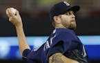 Seattle Mariners starting pitcher James Paxton throws against the Minnesota Twins during the first inning of a baseball game Friday, Sept. 23, 2016, i