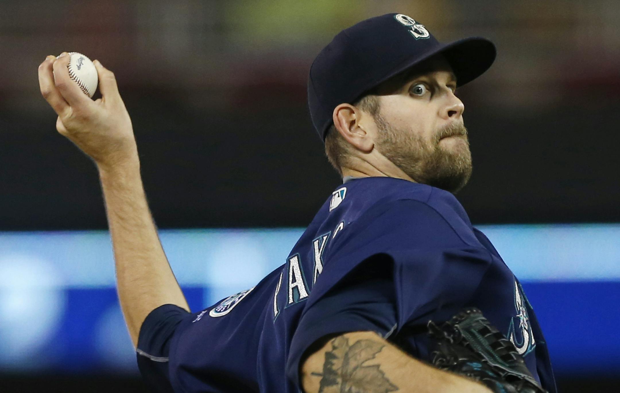 Seattle Mariners starting pitcher James Paxton throws against the Minnesota Twins during the first inning of a baseball game Friday, Sept. 23, 2016, in Minneapolis. (AP Photo/Jim Mone)