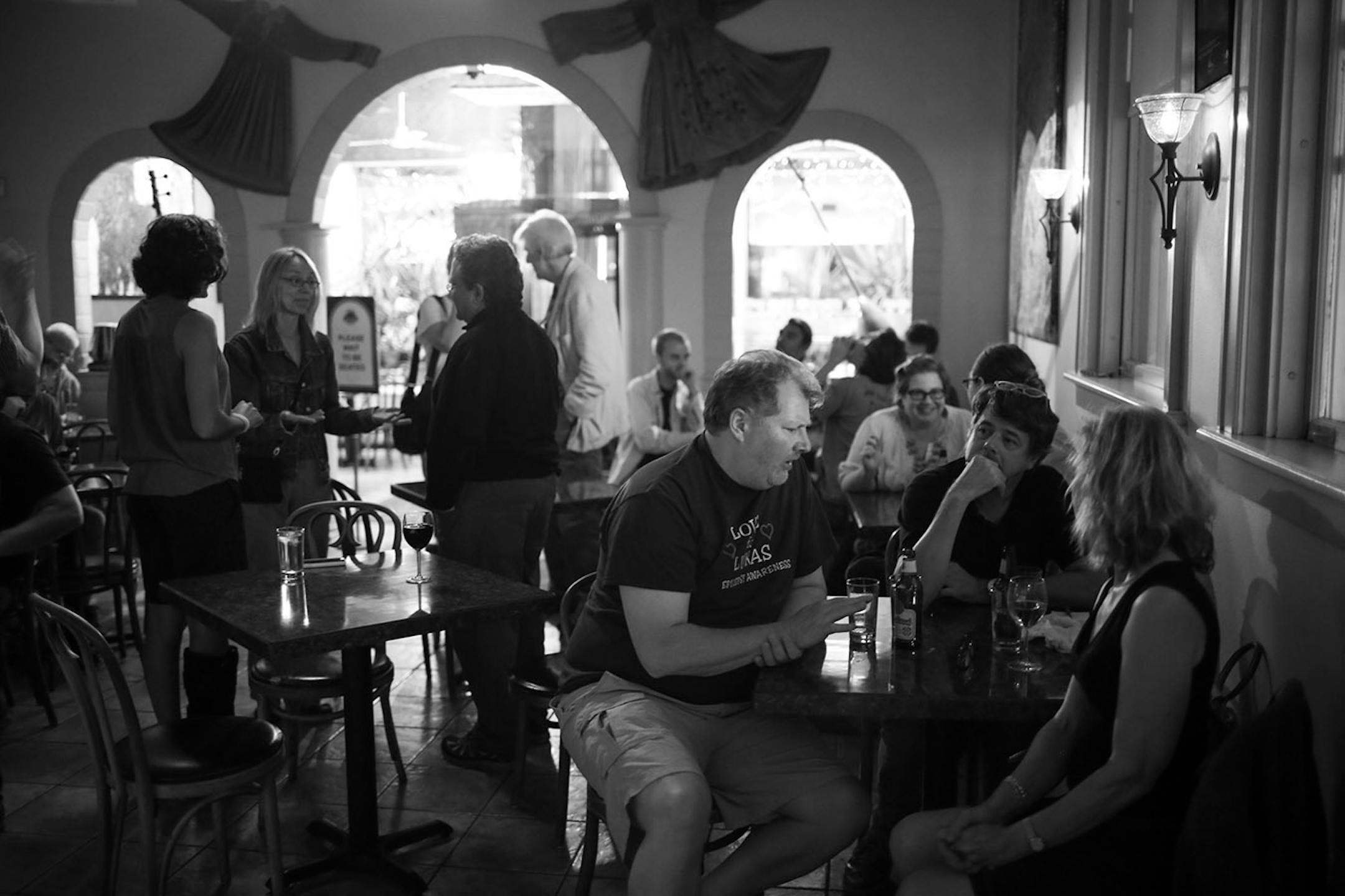 Will Jensen, Joe Otte, and Anne Parks, from left, visited between sets during the Thursday night jazz performance at Khyber Pass earlier this month.