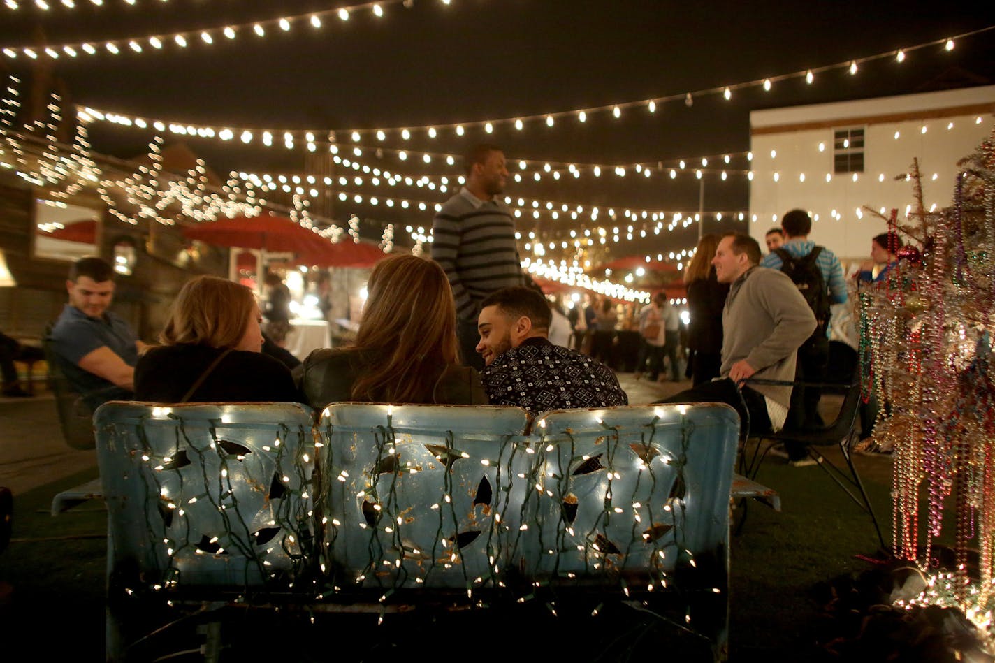 Groups of young people hung out and spent time with each other at Frenchman Art Market in New Orleans.