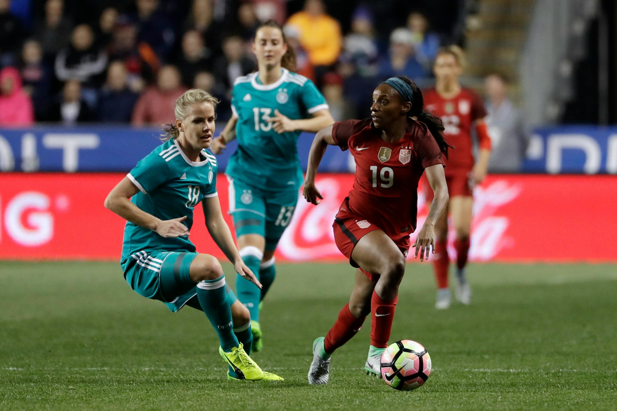 United States' Crystal Dunn, right, in action against Germany's Lena Petermann during the first half of a SheBelieves Cup women's soccer match, Wednesday, March 1, 2017, in Chester, Pa. (AP Photo/Matt Slocum)