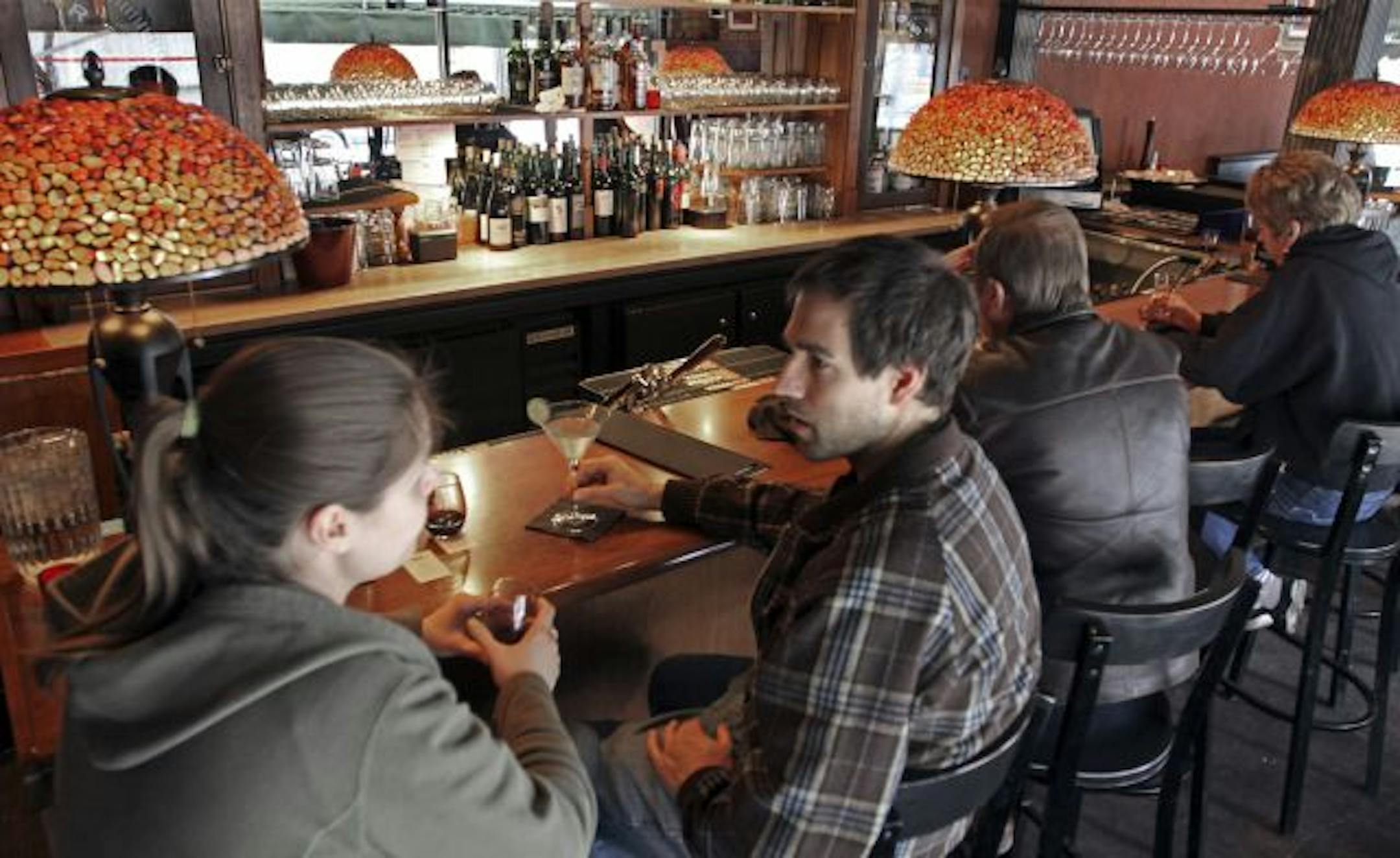 Joanne Zerdy and Will Daddario, both of St. Paul, at Bin Wine Bar