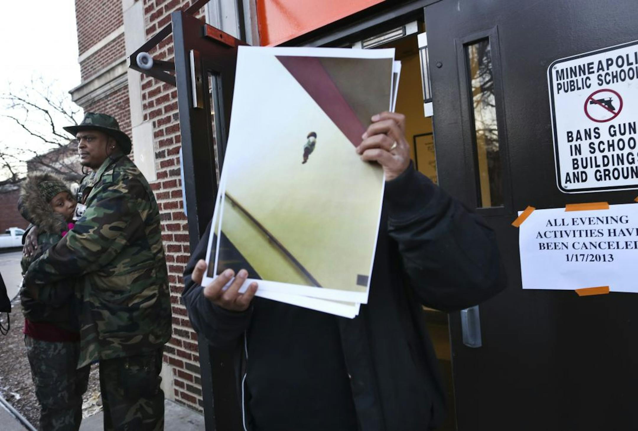 Citizen Juan Coleman held a picture of the incident that he said was circulating on social media. Four students have have been disciplined.