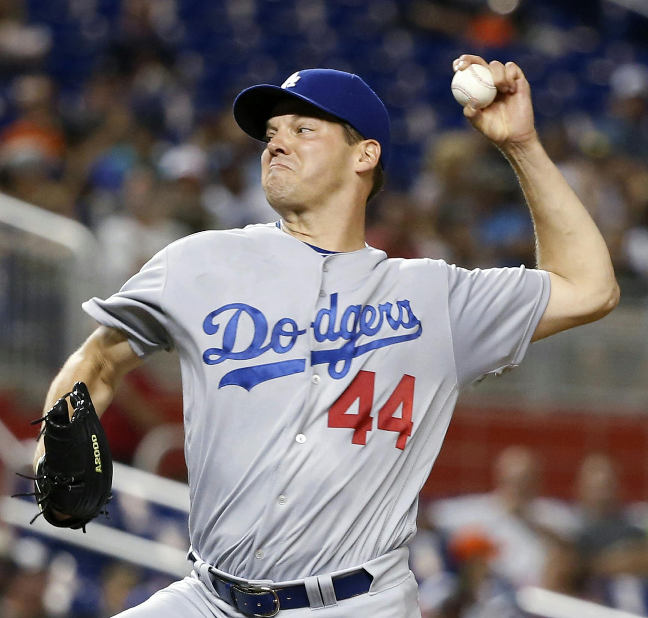 Los Angeles Dodgers' Rich Hill delivers a pitch during the first inning of a baseball game against the Miami Marlins, Saturday, Sept. 10, 2016, in Miami. (AP Photo/Wilfredo Lee)